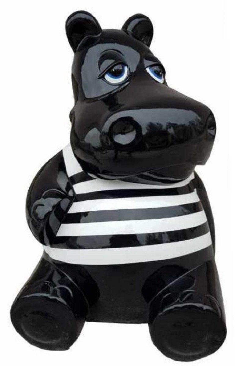 Casa Padrino Skulptur Designer Deko Skulptur Sitzendes Nilpferd Schwarz / Weiß H. 48 cm - Wetterbeständige Dekofigur - Wohnzimmer Deko - Garten Deko - Terrassen Deko