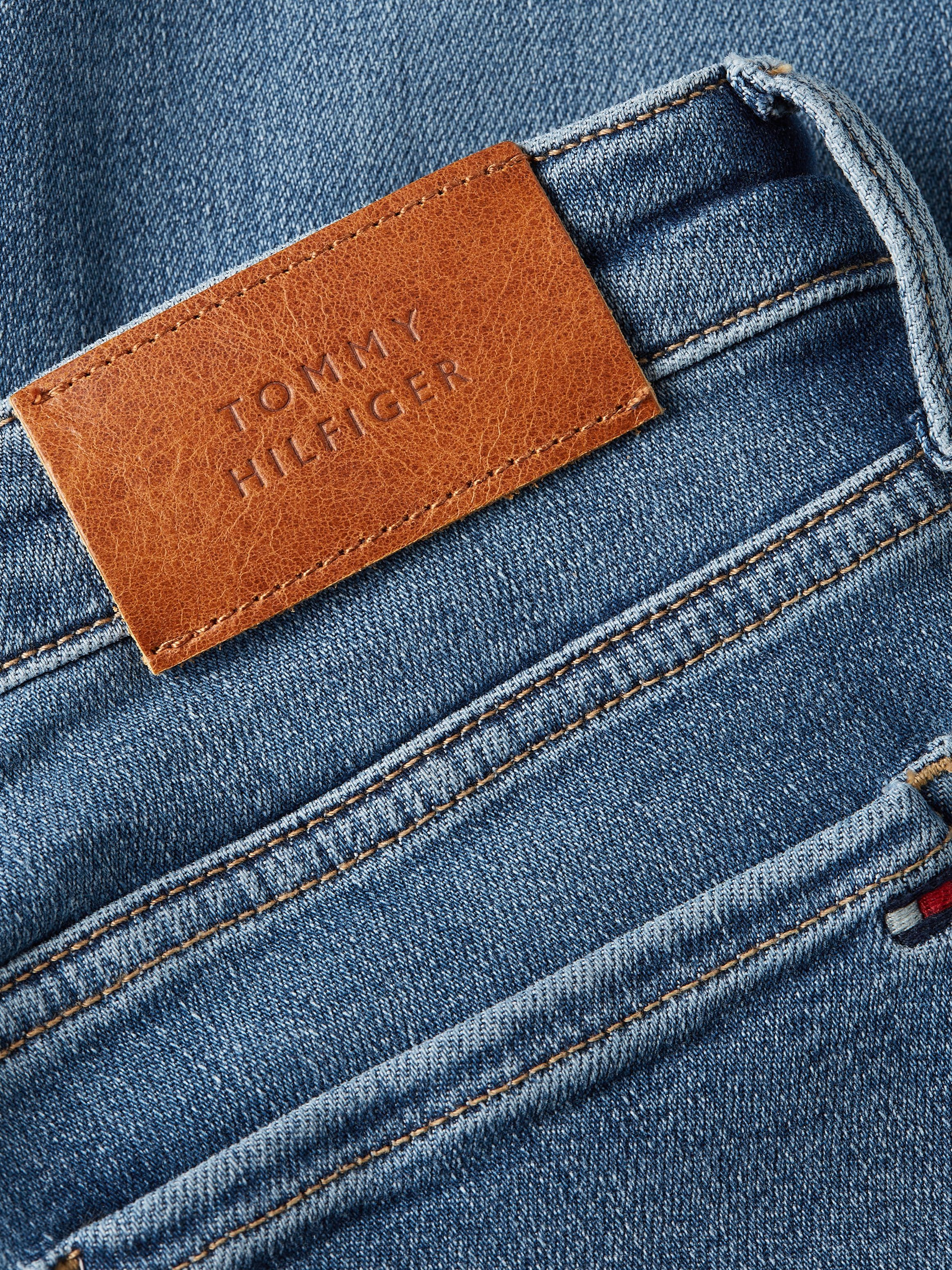 Tommy Hilfiger mit TH SKINNY Logo-Badge Skinny-fit-Jeans RW Hilfiger FLEX COMO GYA Mel Tommy