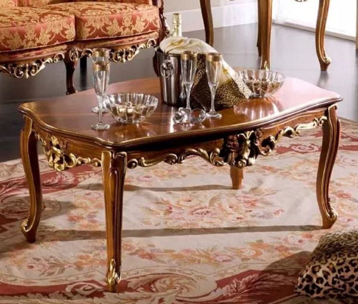 Casa Padrino Couchtisch Luxus Barock Couchtisch Braun / Gold - Handgefertigter Massivholz Tisch im Barockstil - Barock Möbel - Luxus Qualität - Made in Italy