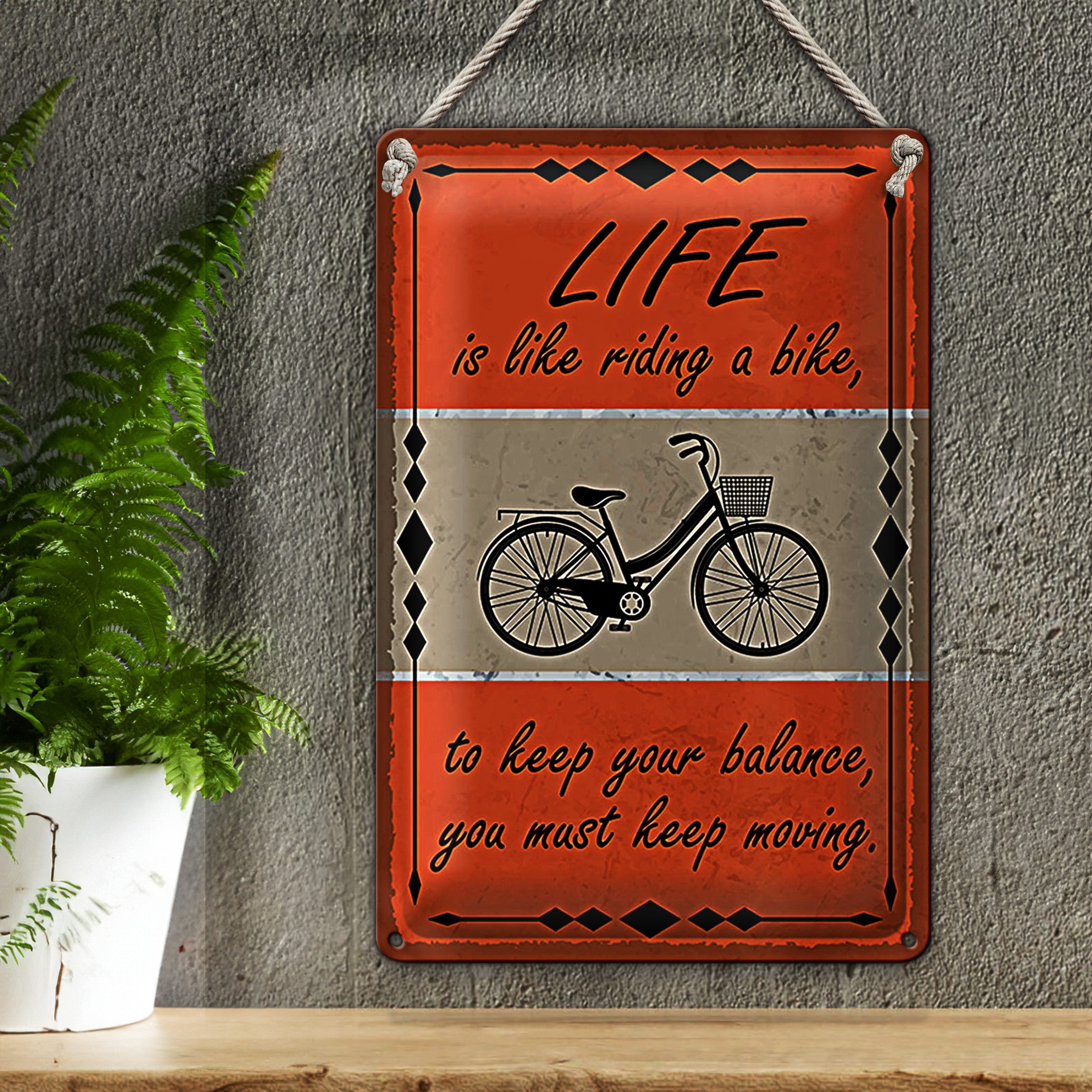 Roomando Metallschild Blechschild Spruch 20x30cm Life is like riding a bike
