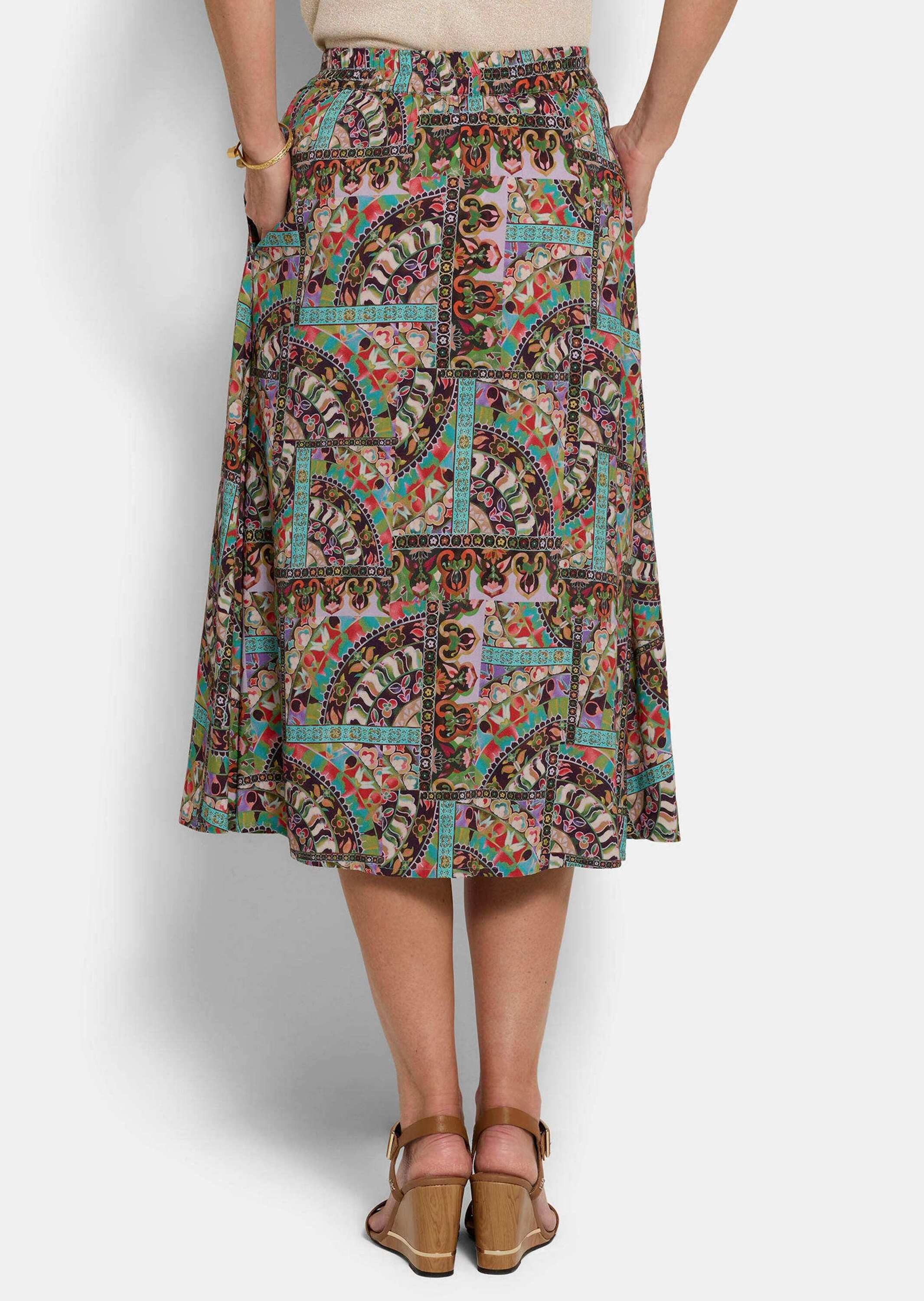 GOLDNER Schlupfrock Kurzgröße: Viskoserock mit Patch-Druck Schlupfrock mit Rundum-Dehnbund, Nahttaschen und Knielänge