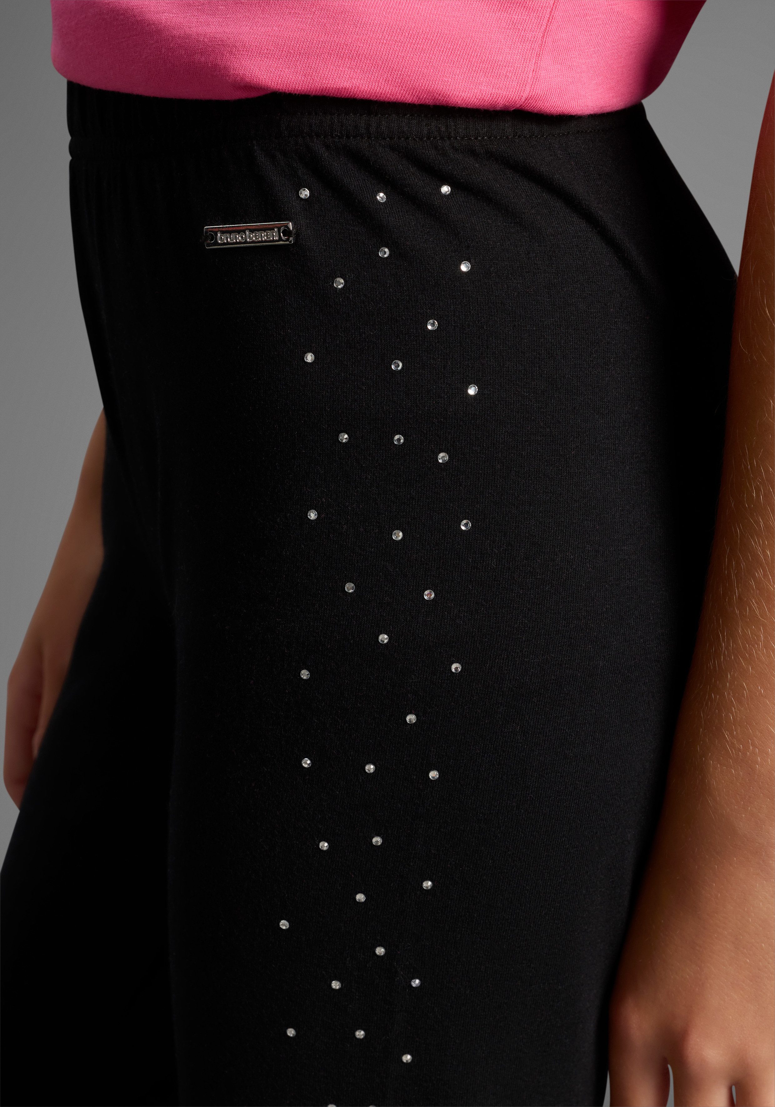 Bruno Banani Leggings mit glitzernden Strass-Steinen an der Seite, für Mädchen Für TEENS. Glitzer-Leggings
