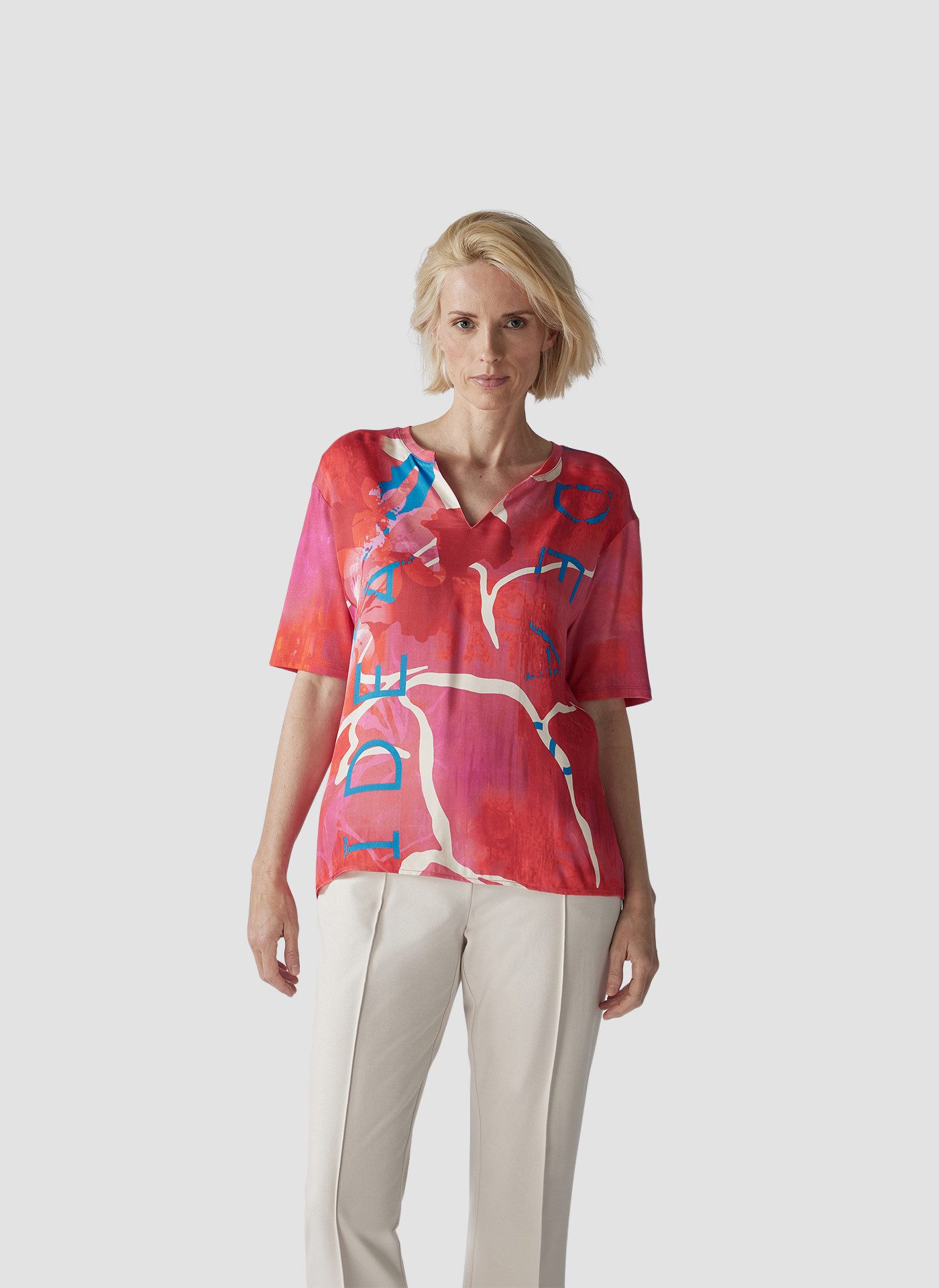 Print-Shirt LeComte Farbenfrohes T-Shirt mit grafischem Muster