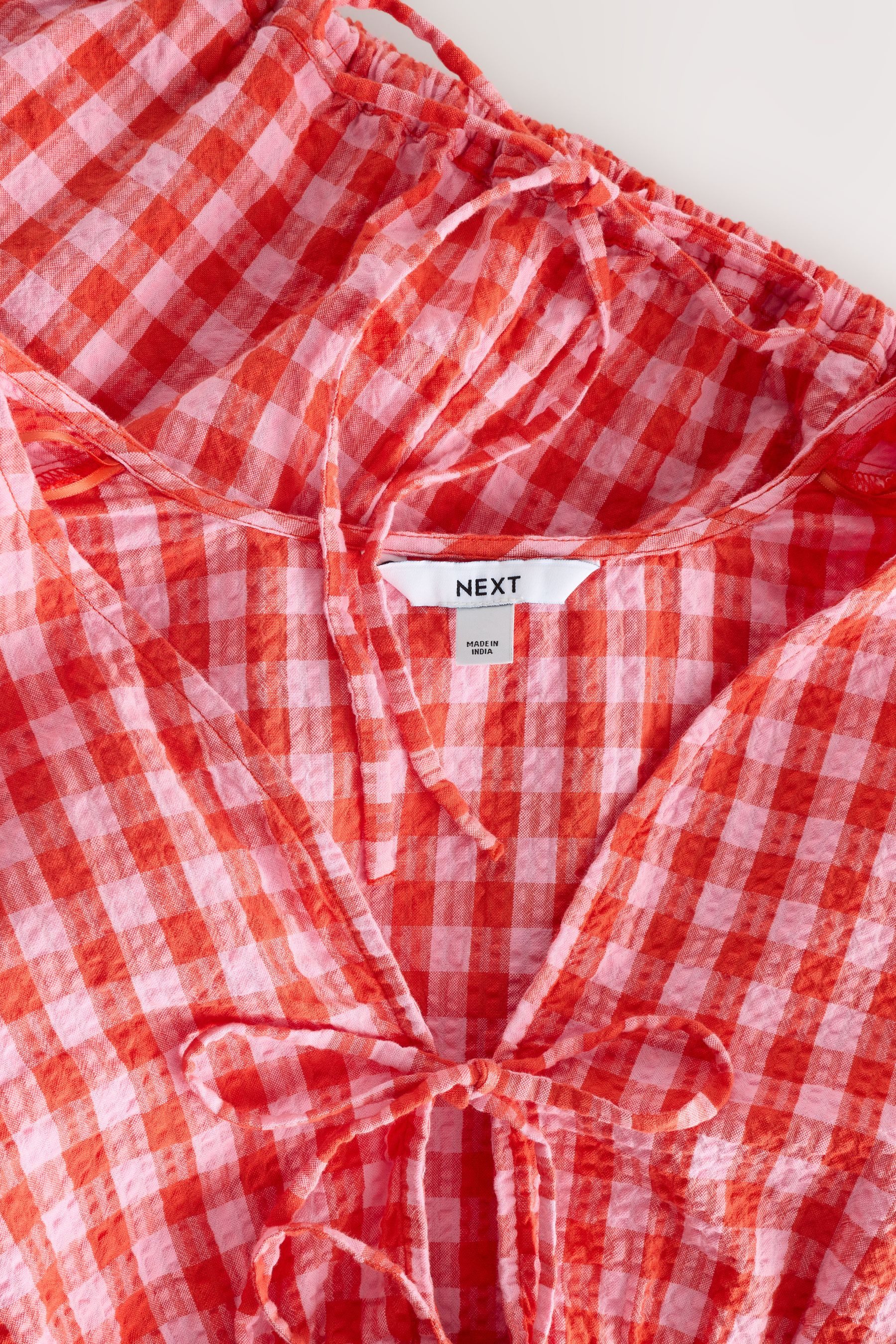 Next Kurzarmbluse Bluse mit Puffärmeln, Vichykaros und Bindedetail (1-tlg)