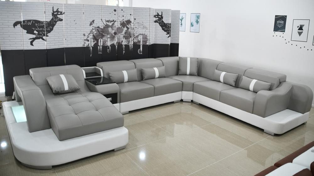 Xlmoebel Ecksofa Elegantes Ledersofa mit Textil-Polsterung für gemütliche Stunden, Hergestellt in Europa