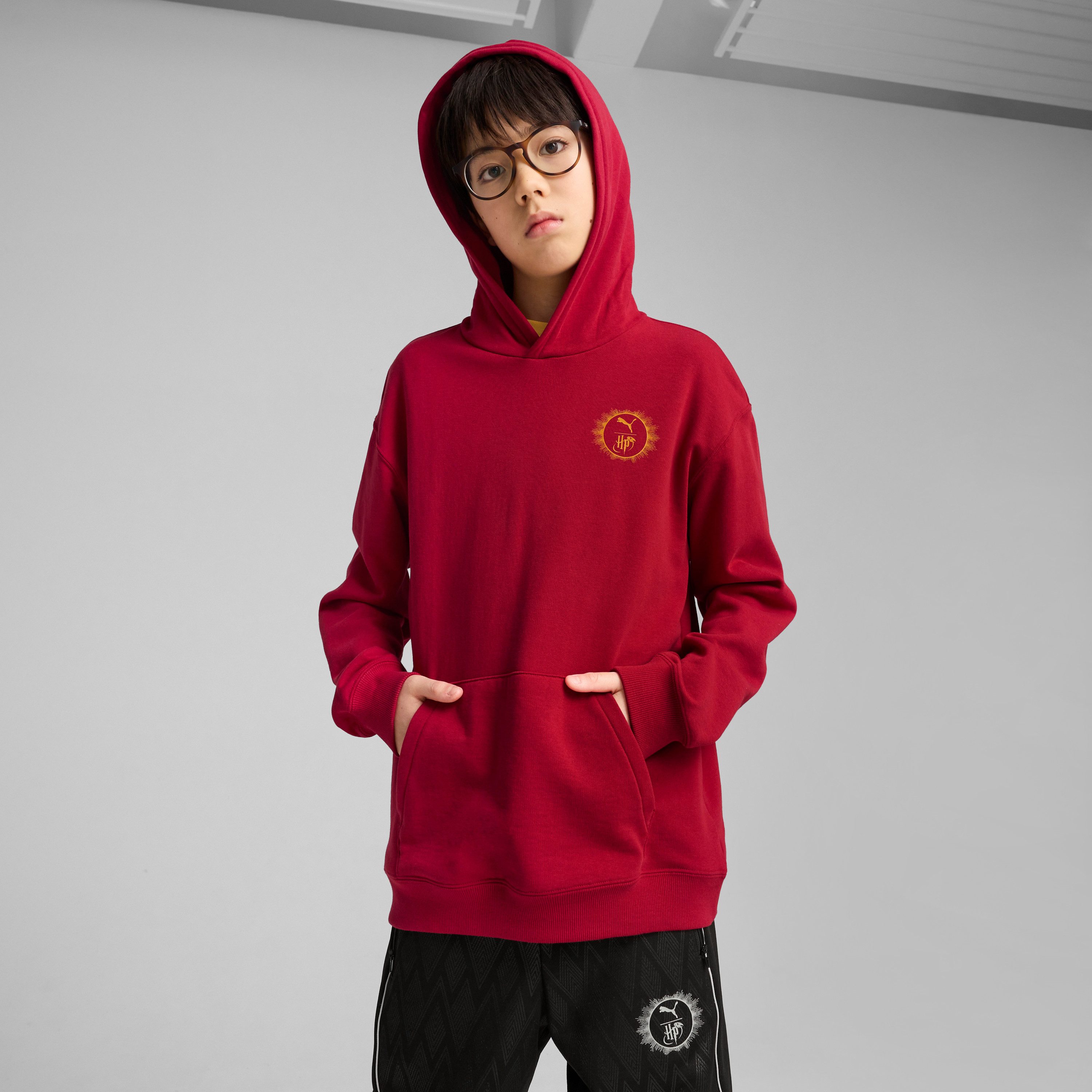 PUMA Kapuzensweatshirt X HARRY POTTER RELAXED GRAPHIC HOODIE TR mit Kängurutasche, mit gerippten Bündchen und Saum