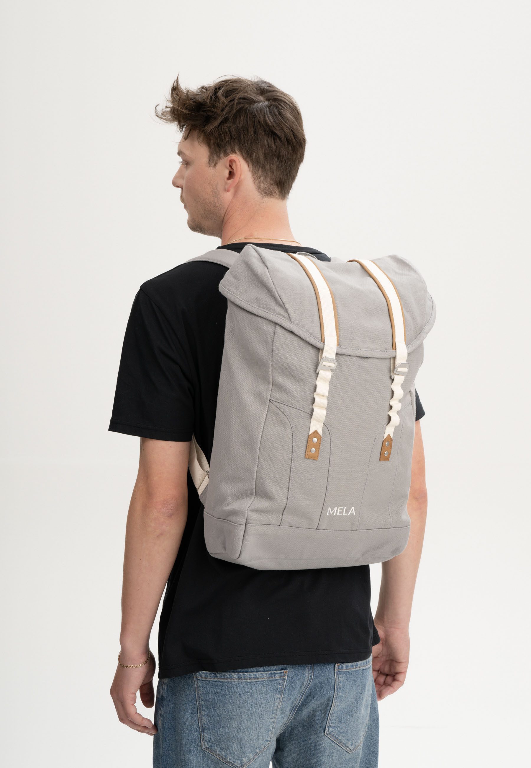 MELA Rucksack Rucksack Style MELA V, Seitlich verstecktes Fach für Kleinteile wie Handy und Kosmetika