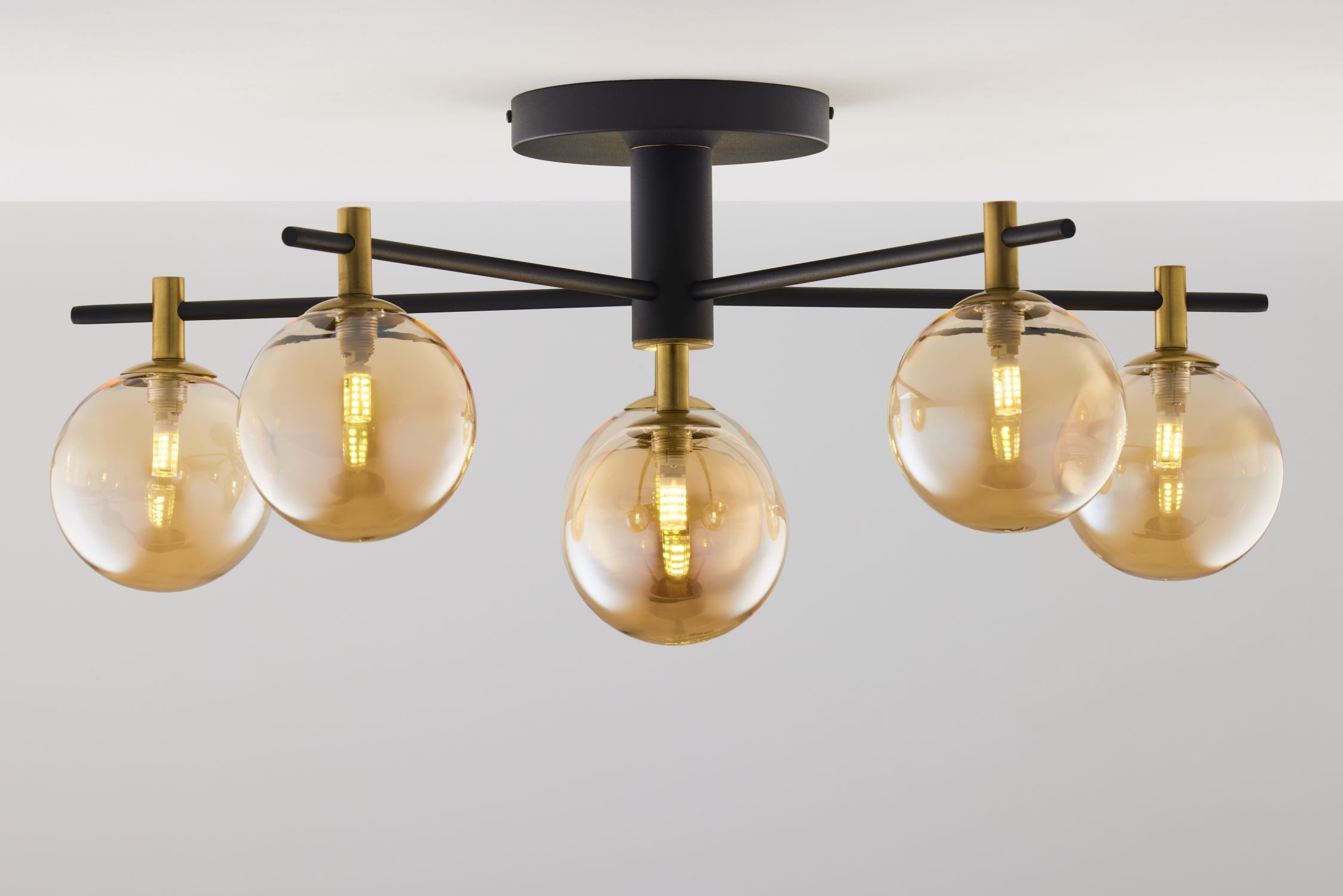 Licht-Erlebnisse Deckenleuchte WOBLAL, ohne Leuchtmittel, Rauchglas Metall G9 in Schwarz Bernstein Gold 6-flammig Kugel Schirm