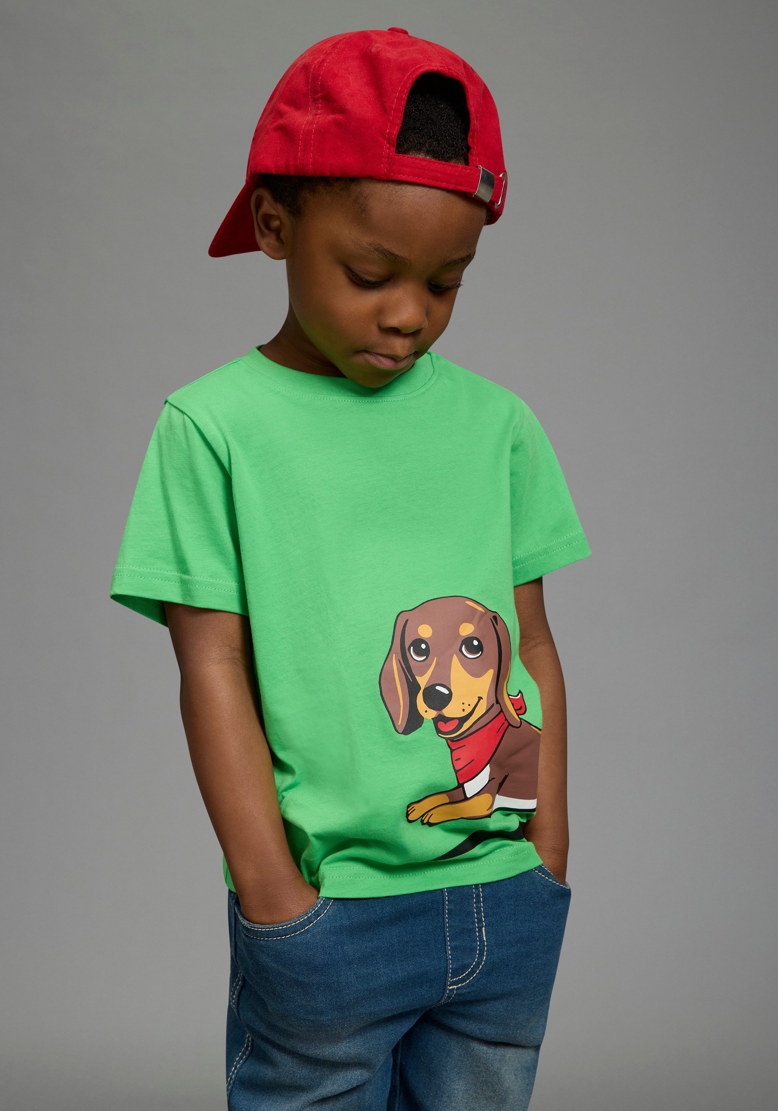 KIDSWORLD T-Shirt Shirt mit rundum Dackel-Print Basic Passform, Kurzarm, bedruckte Optik, aus Baumwolle