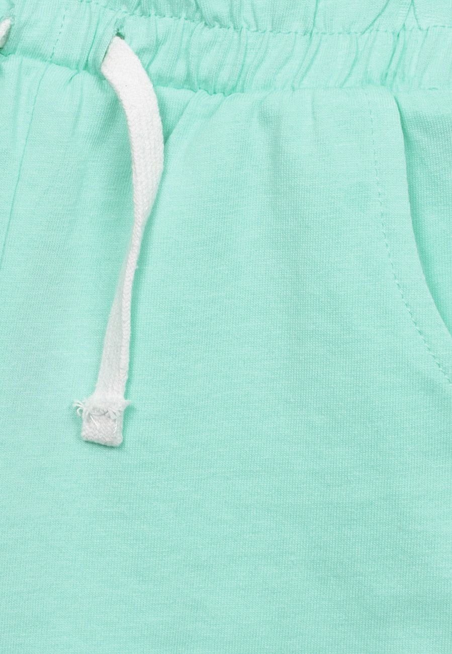 MINOTI Sweatshorts Shorts mit (1y-14y) Strickbündchen dekorativem Mintgrün