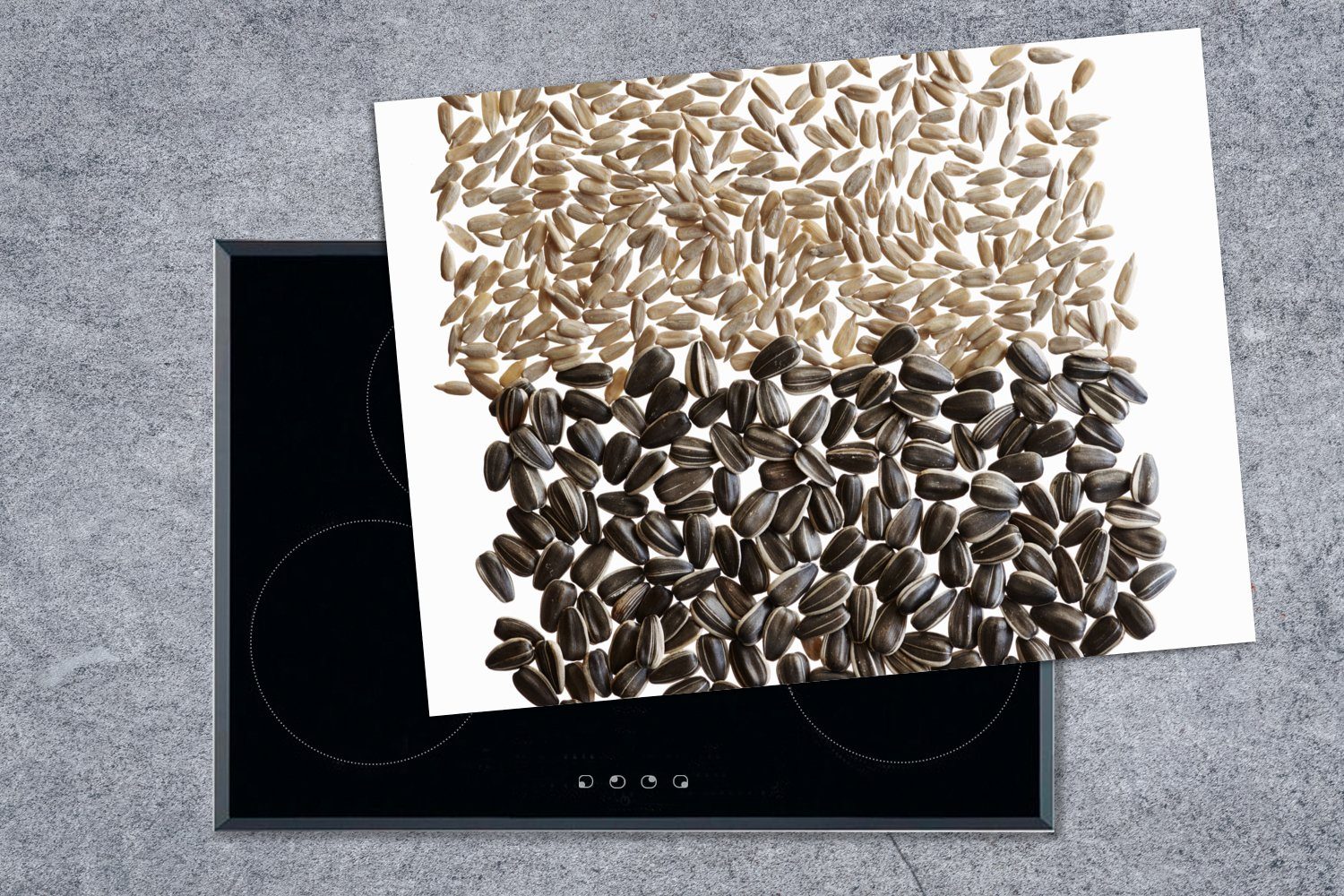 MuchoWow Herdblende-/Abdeckplatte 70x52 Ceranfeldabdeckung Arbeitsfläche cm, und tlg), Schale, der nutzbar, Sonnenblumenkerne, in (1 Vinyl, ungeschält Mobile
