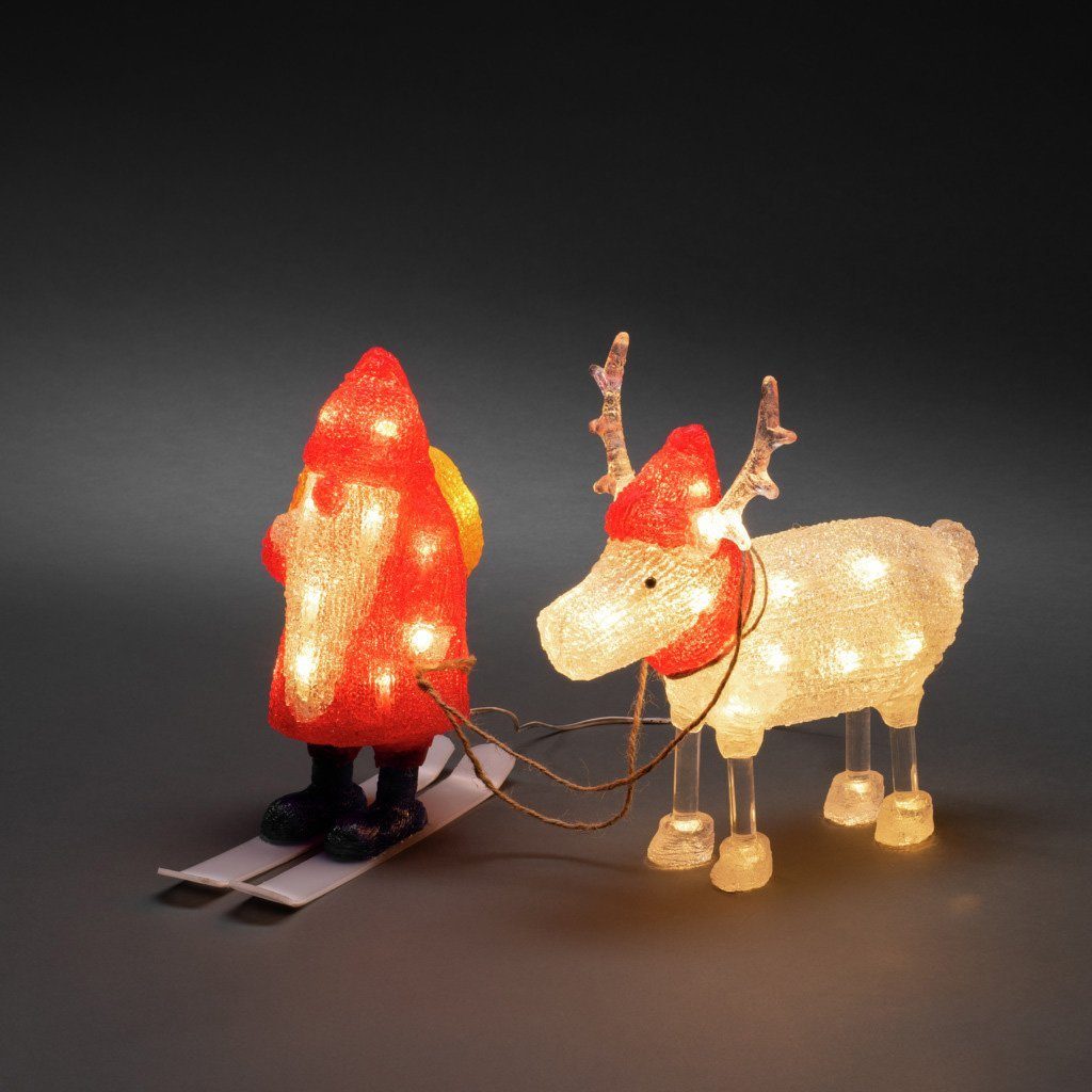 KONSTSMIDE LED Dekofigur Acryl integriert, 40 Warmweiß, LED Rentier, Dioden weiße rot aussen, und Weihnachtsdeko Weihnachtsmann fest warm