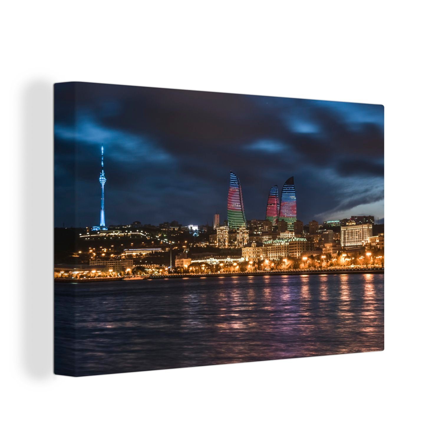 in Wandbild über (1 Baku Dunkle 30x20 Wolken OneMillionCanvasses® beleuchteten cm Aserbaidschan, Wanddeko, Leinwandbild Aufhängefertig, der Stadt Leinwandbilder, St),