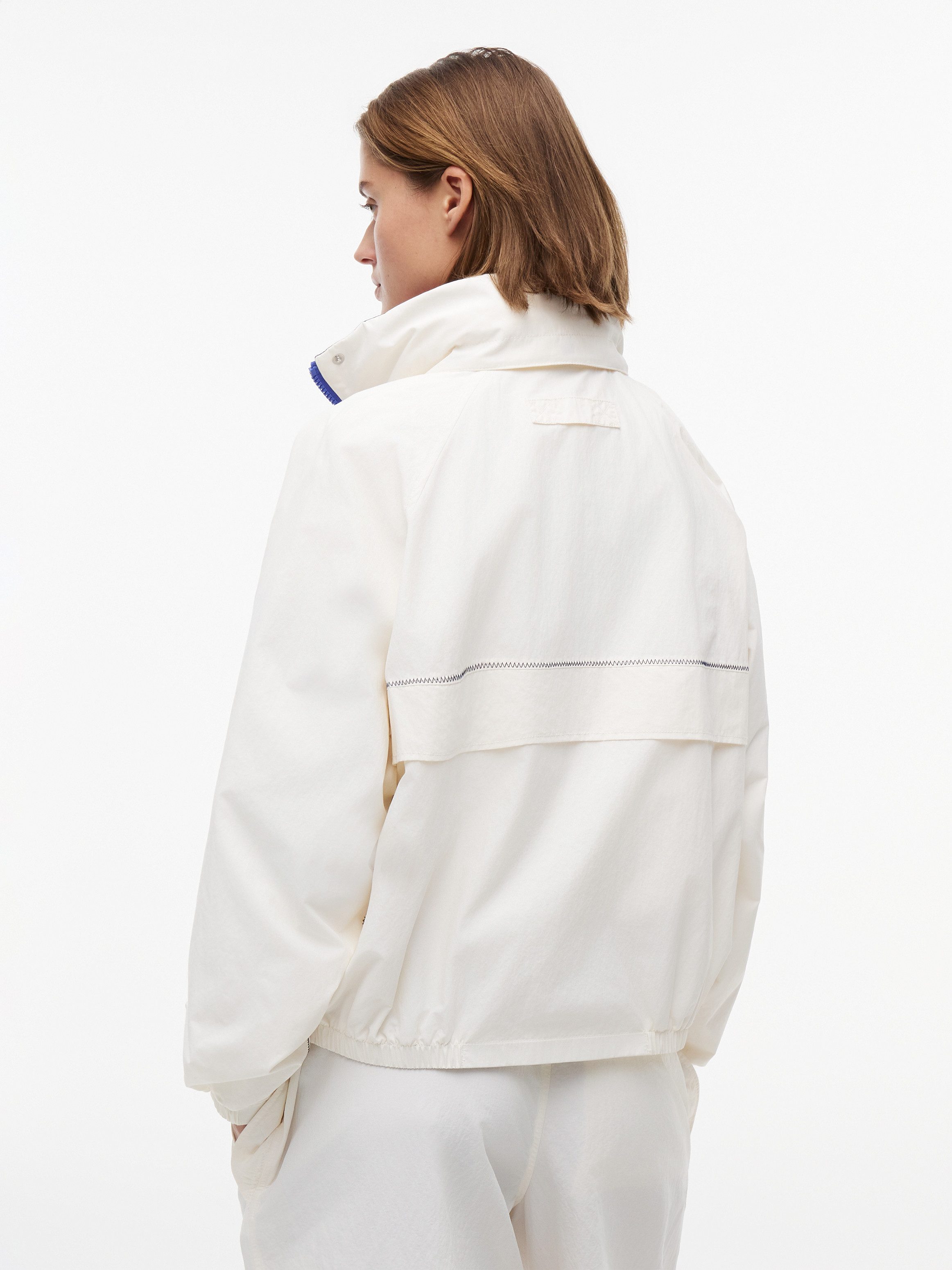 Tommy Jeans Windbreaker TJW COLORBLOCK WINDBREAKER Kunstfaser, elastische Bündchen, verdeckter Reißverschluss