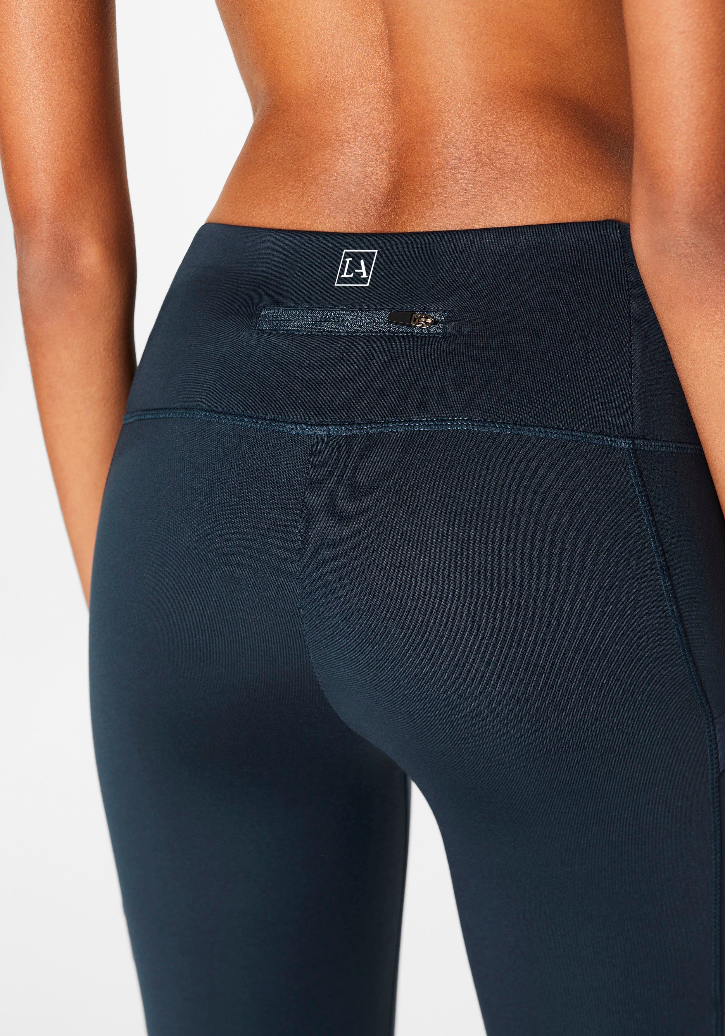 LASCANA Hybrid mit praktischen petrol ACTIVE Leggings Lauftights ; Thermo-Trekkinghose Taschen