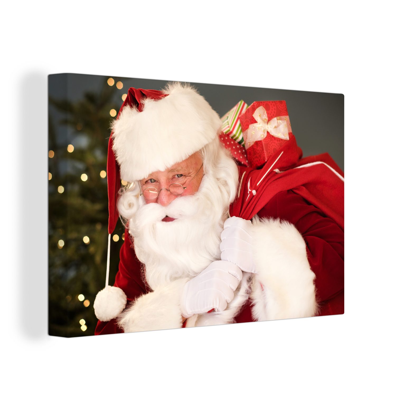 OneMillionCanvasses® Leinwandbild Ein Porträt des Weihnachtsmanns, der einen roten Sack über der, (1 St), Wandbild Leinwandbilder, Aufhängefertig, Wanddeko, 30x20 cm