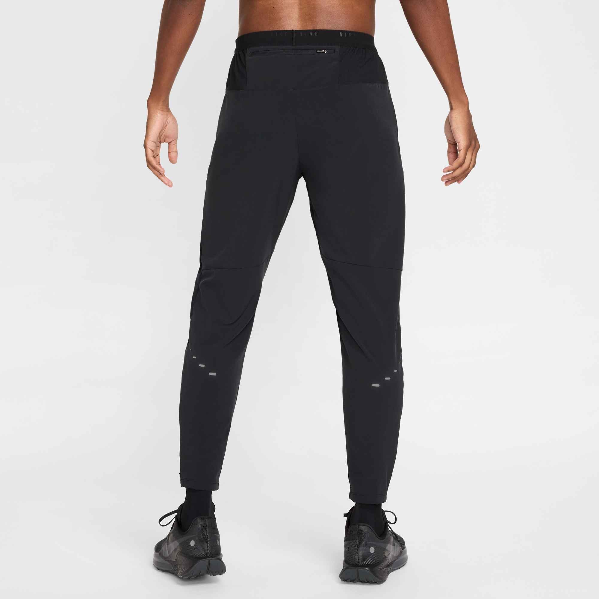 Nike Laufhose M NK DF STRIDE WVN PANT schweißableitendes Material, flache Nähte, mit Taschen