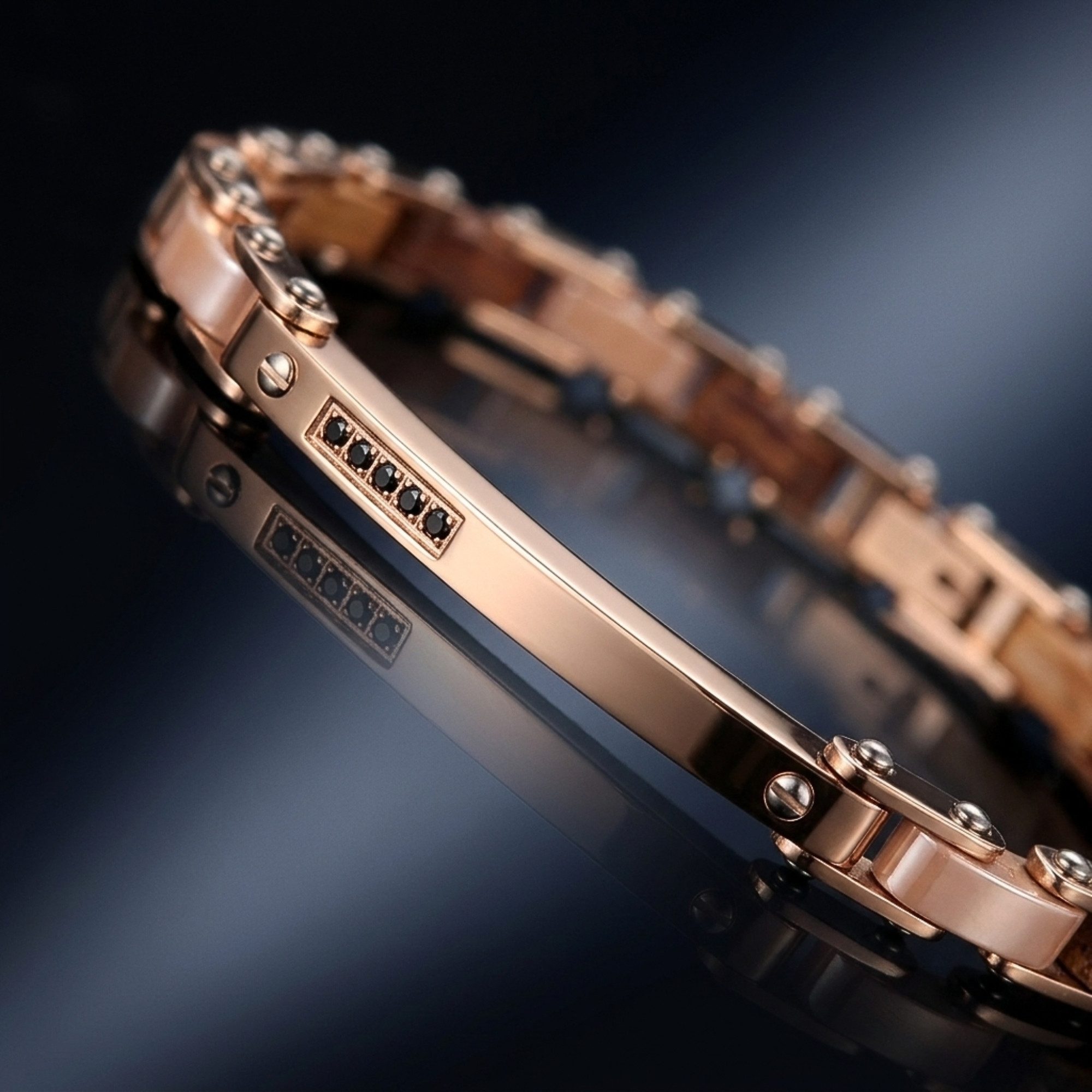 UNIQAL.de Edelstahlarmband CALDO HOLZ ROSEGOLD – Warme Holzstruktur mit feinem Goldglanz (harmonische Materialkomposition mit funkelndem Zirkonia-Finish, Handgefertigt in Deutschland · inkl. edler Schmuckverpackung), Einzigartige Holzmaserung · Hautfreundlich · Flexibel verstellbar