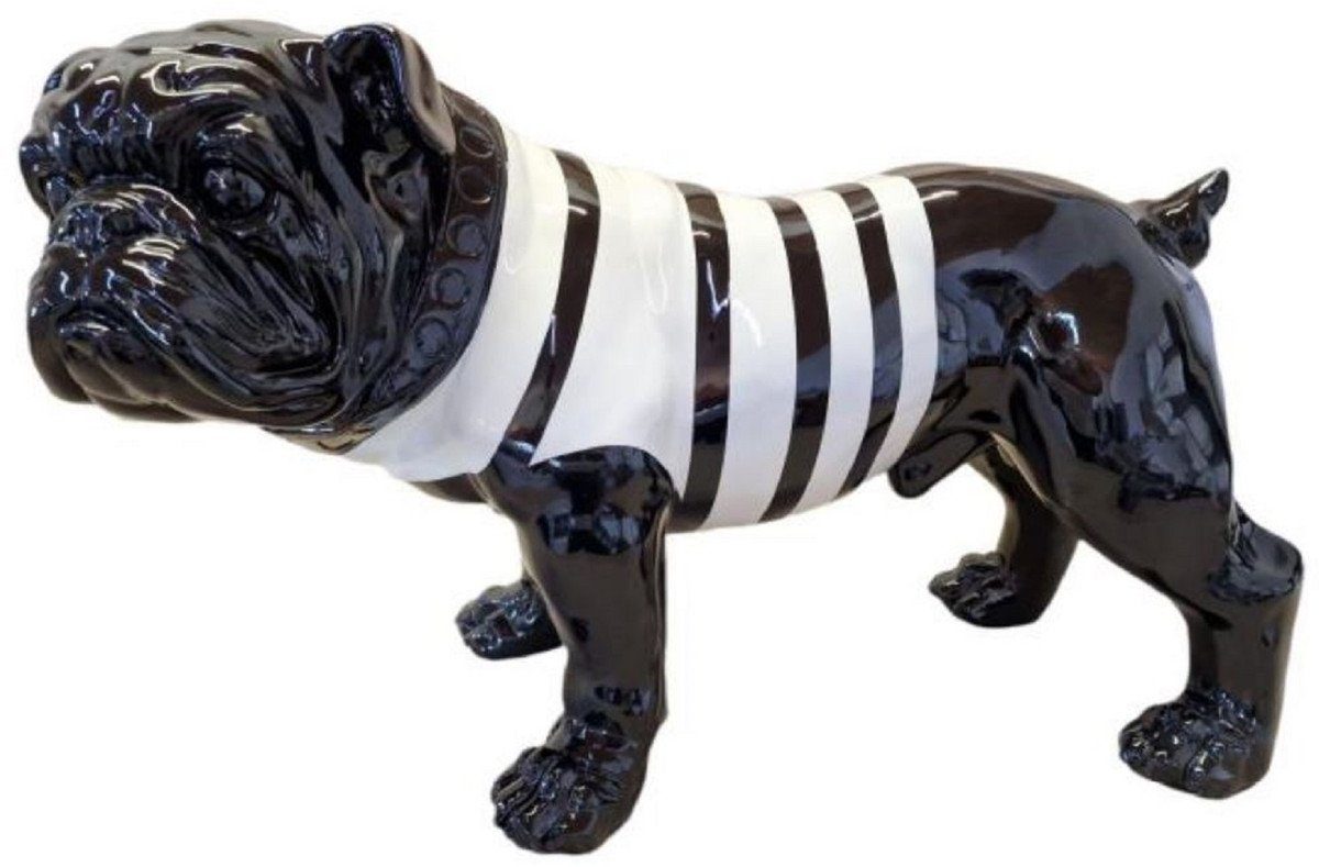 Casa Padrino Skulptur Luxus Dekofigur Hund Bulldogge Schwarz / Weiß 59 x H. 40 cm - Wetterbeständige Deko Skulptur - Wohnzimmer Deko Figur - Garten Deko Figur - Luxus Deko Tierfigur