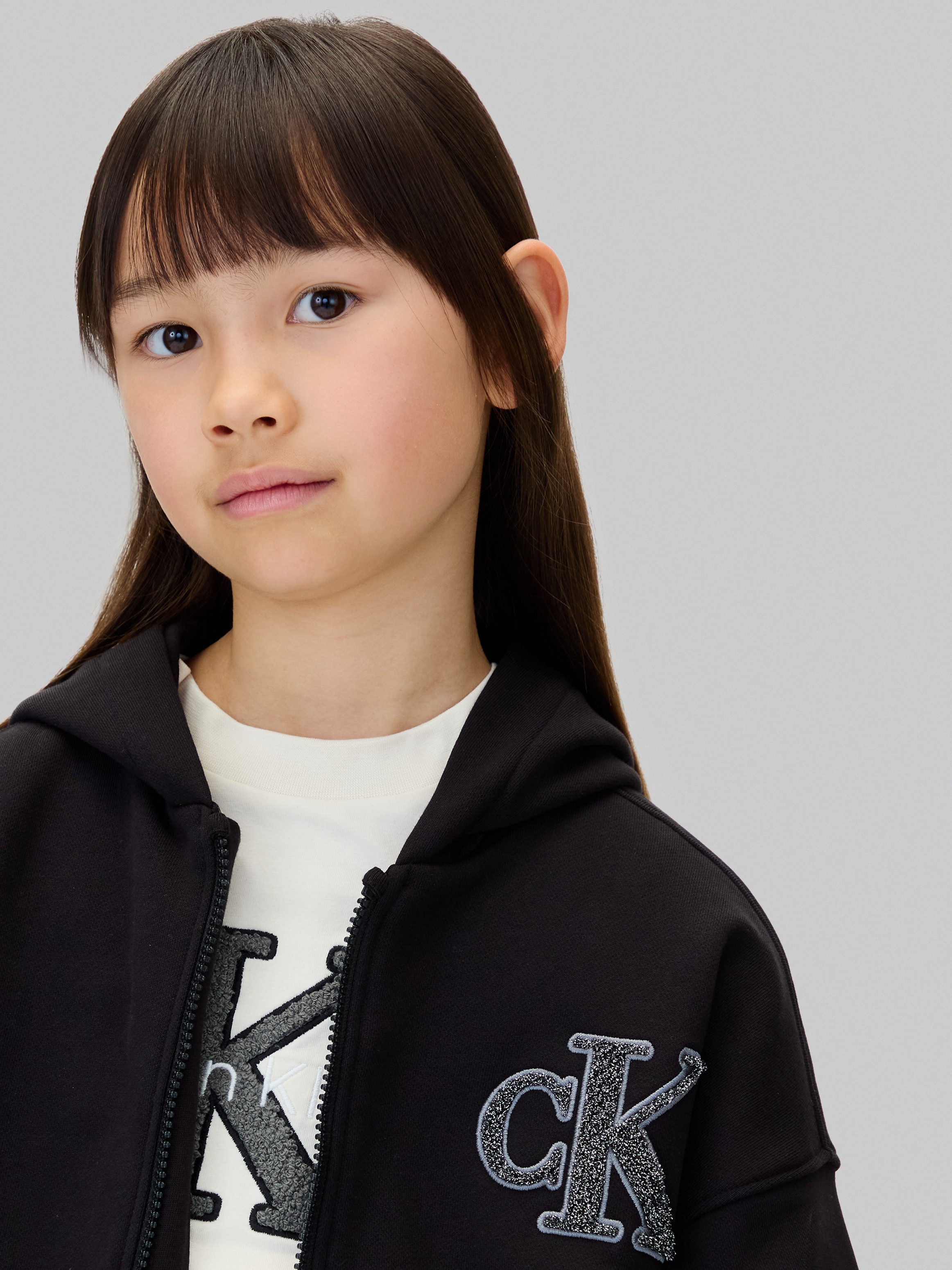 Calvin Klein Jeans Sweatjacke CK LOGO TERRY ZIP THROUGH für Kinder bis 16 Jahre, mit Glitzer-Applikation