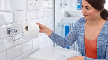 tesa Toilettenpapierhalter HUKK Toilettenrollenhalter ohne Bohren - 9,5 cm : 14,7 cm : 6,7 cm (Packung, 1-St., inkl. Klebelösung), selbstklebender WC-Rollenhalter - chrom - silber glänzend
