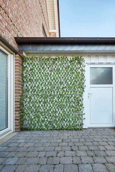 Andiamo Kunsthecken-Sichtschutz Spalier Jadeblatt, ausziehbarer Zaun, mit Kunstranke, natürliche Optik, Sichtschutz