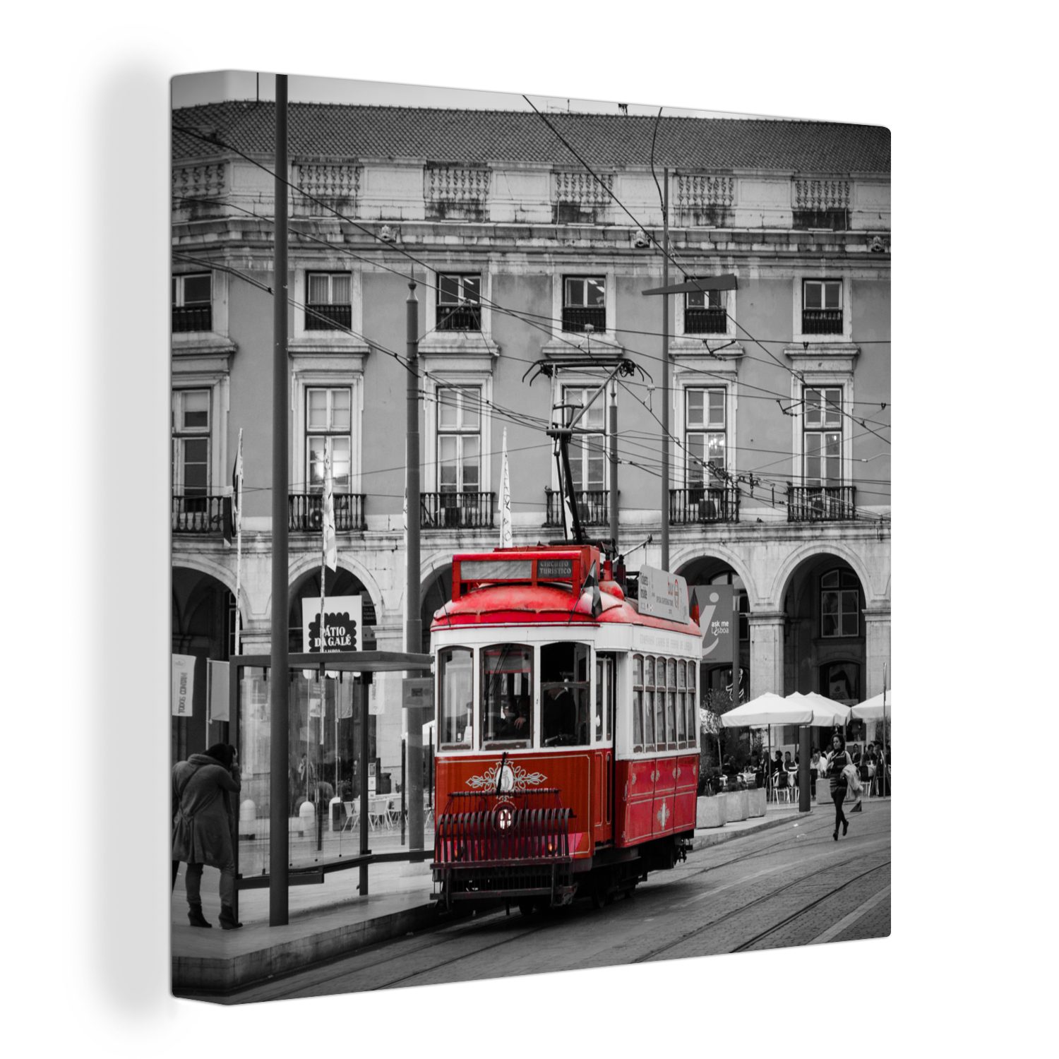 OneMillionCanvasses® Leinwandbild Schwarz-Weiß-Foto mit einer roten Straßenbahn, (1 St), Leinwand Bilder für Wohnzimmer Schlafzimmer