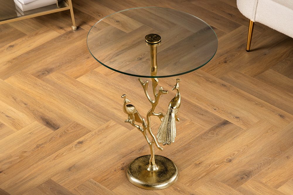 riess-ambiente Beistelltisch WILDLIFE PEACOCK 60cm gold / transparent · Wohnzimmertisch aus Metall (Einzelartikel, 1-St), mit Glas-Tischplatte · rund · handmade · Pfauen-Skulptur · Design
