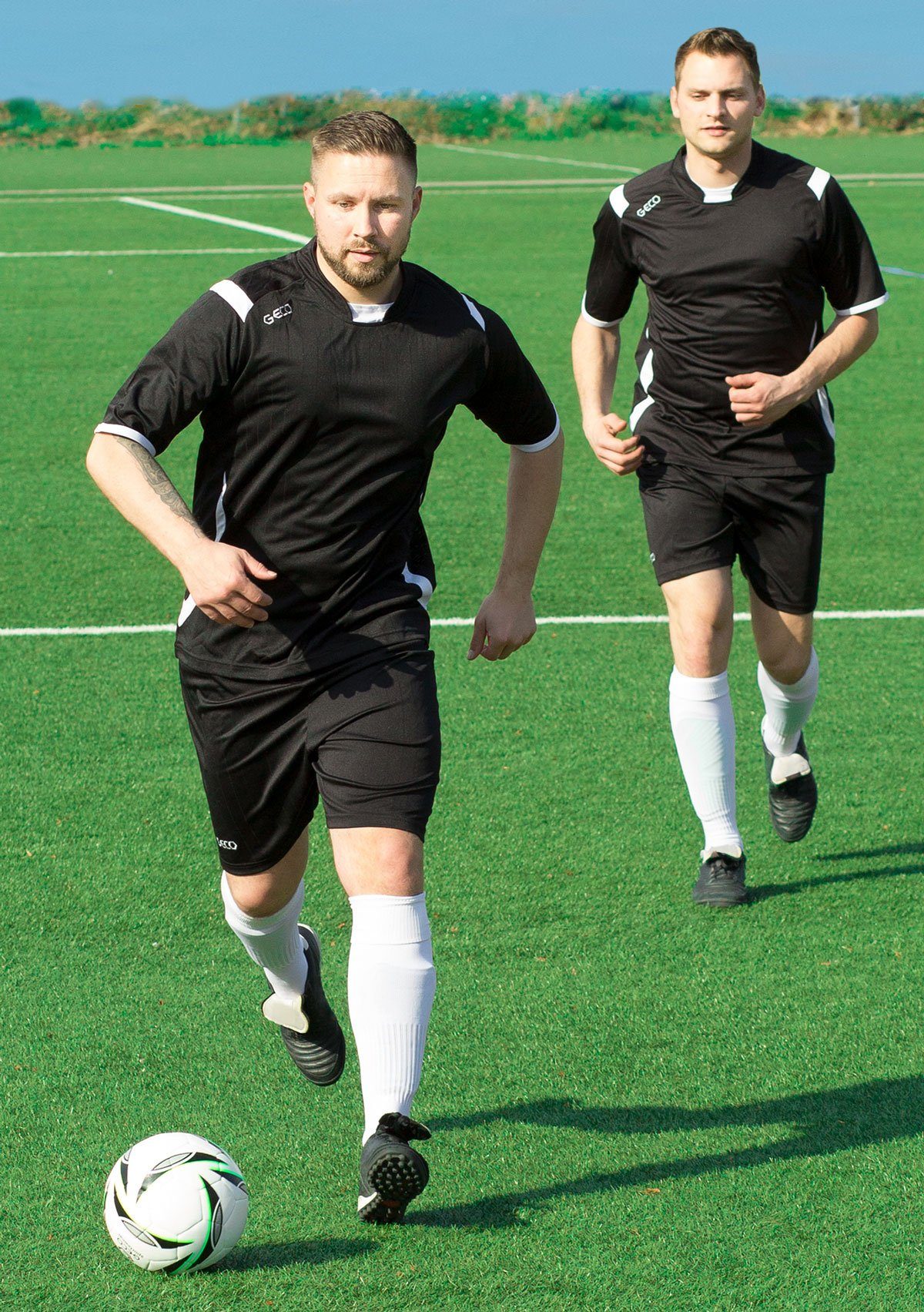 Sportswear kurzarm Einsätze Fußball Levante Geco orange/schwarz Fußballtrikot Geco seitliche zweifarbig Fußballtrikot Mesh Trikot