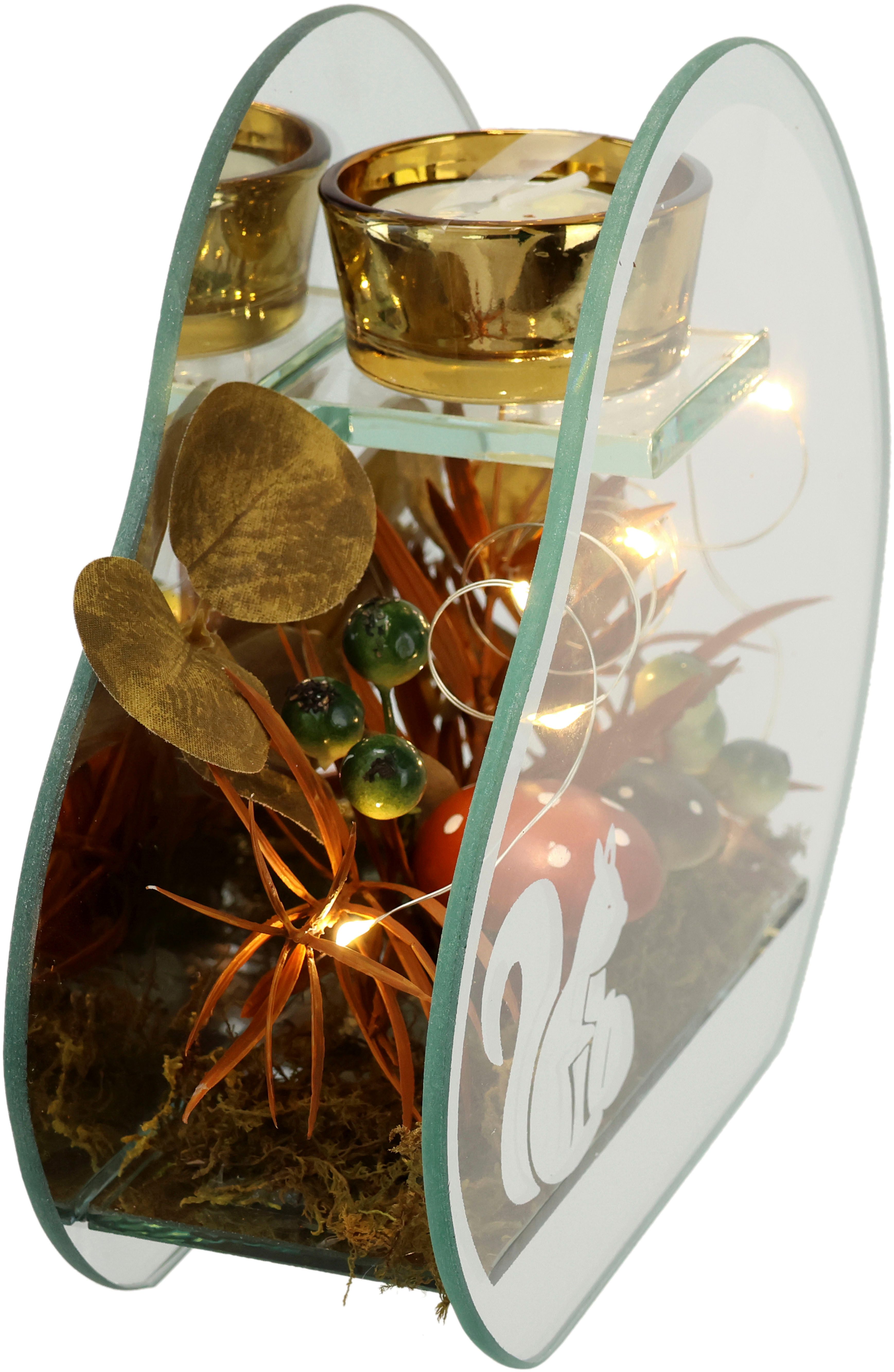 I.GE.A. Teelichthalter Teelichthalter aus Glas mit Teelichtkerze (1 St), Herbstlich dekoriert mit Pilze Eichhörnchen Herbstlaub Kerze Windlicht