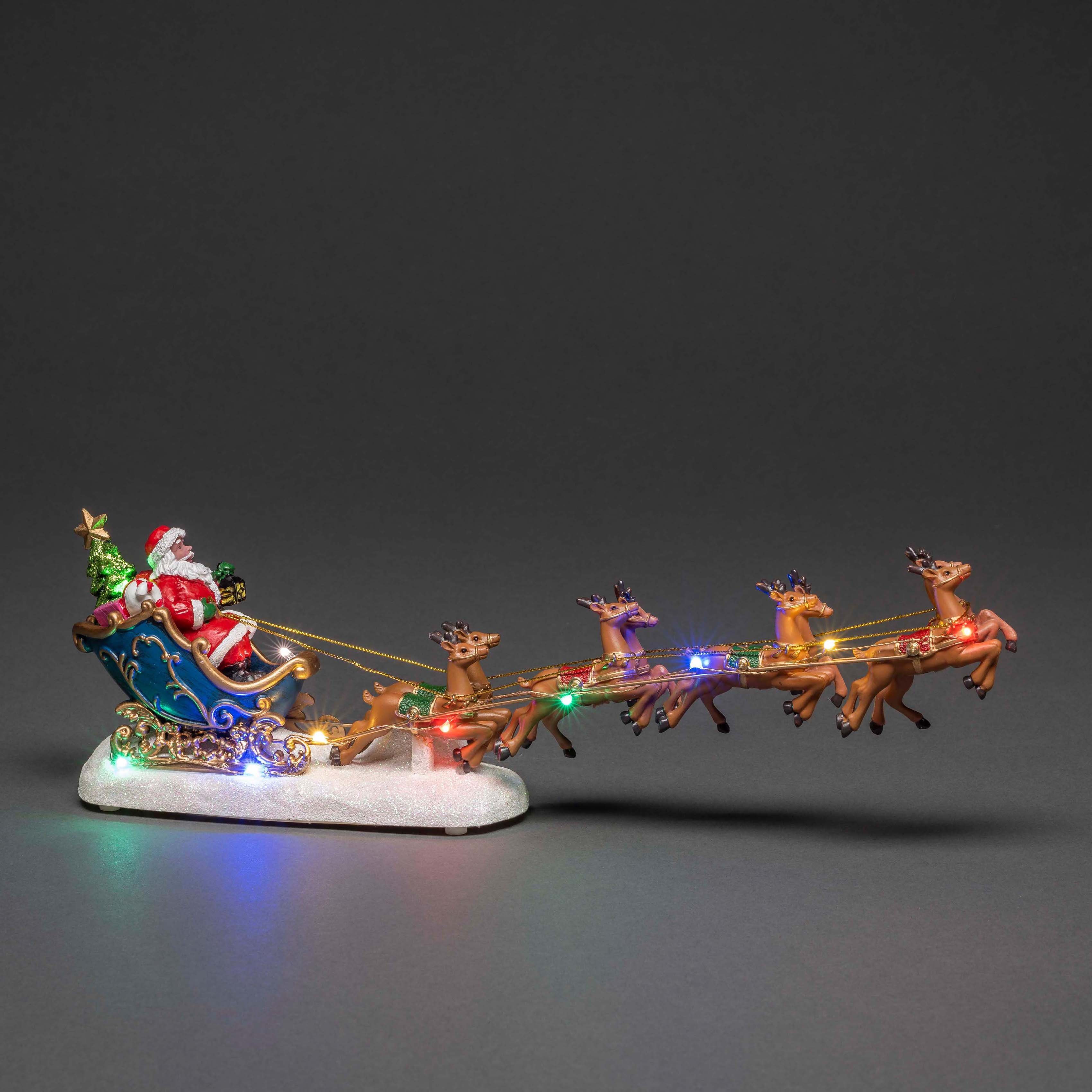 fest Schlitten ca. Dekofigur im LED LED Rentieren, integriert, Höhe KONSTSMIDE Weihnachtsmann 14 cm mit Weihnachtsdeko,