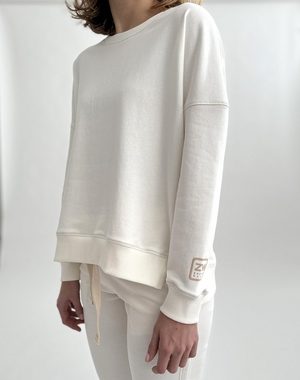 Zuckerwatte Sweatshirt mit edlem Logoprint aus wertiger Baumwollmischung, seitlich geschlitzt
