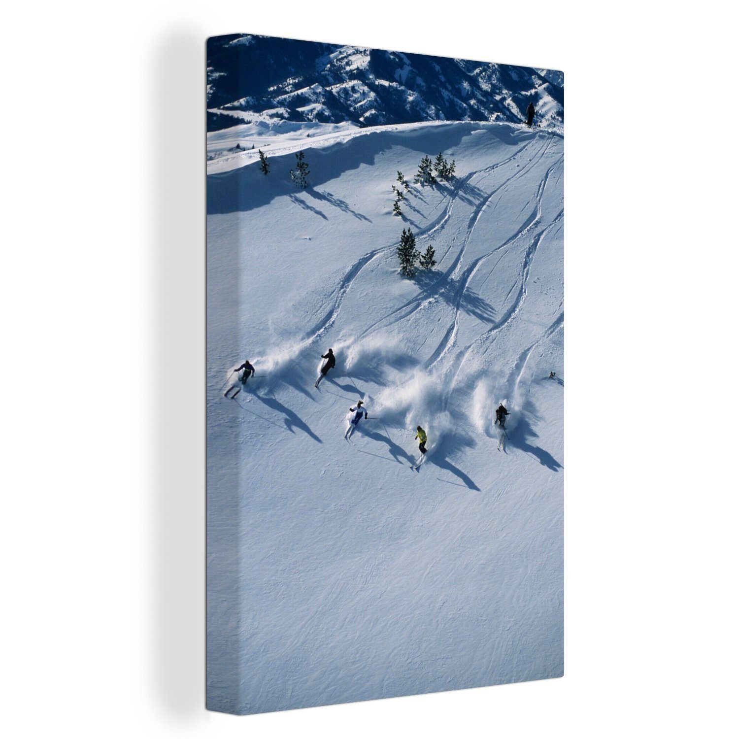 OneMillionCanvasses® Leinwandbild Eine Gruppe von Menschen fährt auf Skiern durch Sun Valley in den USA, (1 St), Leinwandbild fertig bespannt inkl. Zackenaufhänger, Gemälde, 20x30 cm