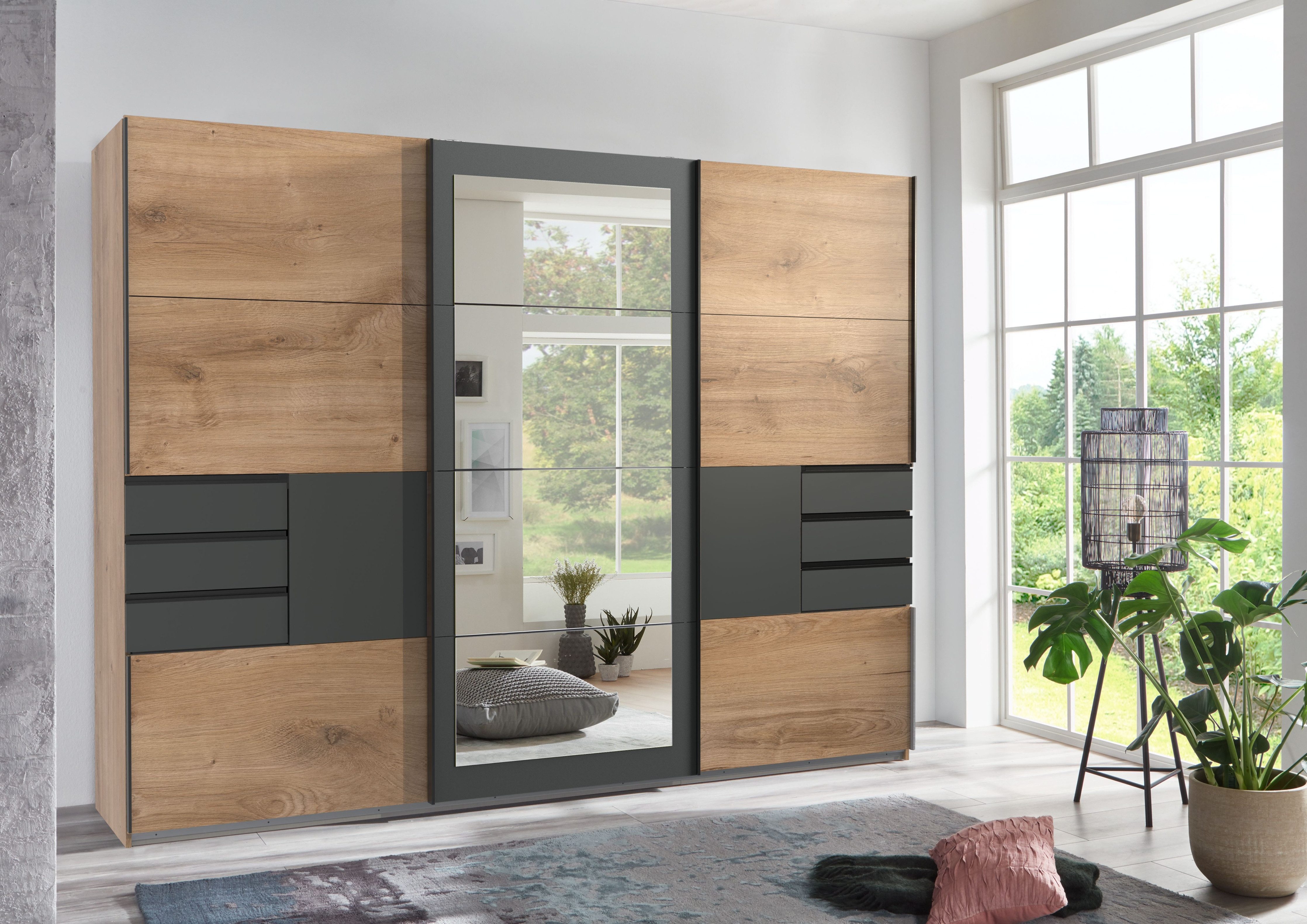 luma-home Schwebetürenschrank 22503 (B270/H208/T64 cm Kleiderschrank mit Vollausstattung, schwarzen Griffleisten) 6 sichtbaren Schubladen,Rahmenspiegel, Eiche Dekor m.Absetz. in Grafit