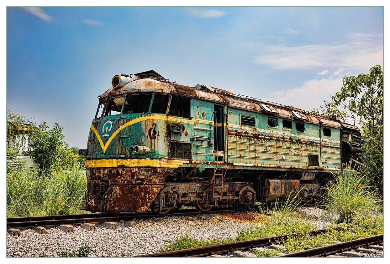 Wallario Küchenrückwand Alte verrostete Lokomotive auf einem Abstellgleis, (1-tlg)