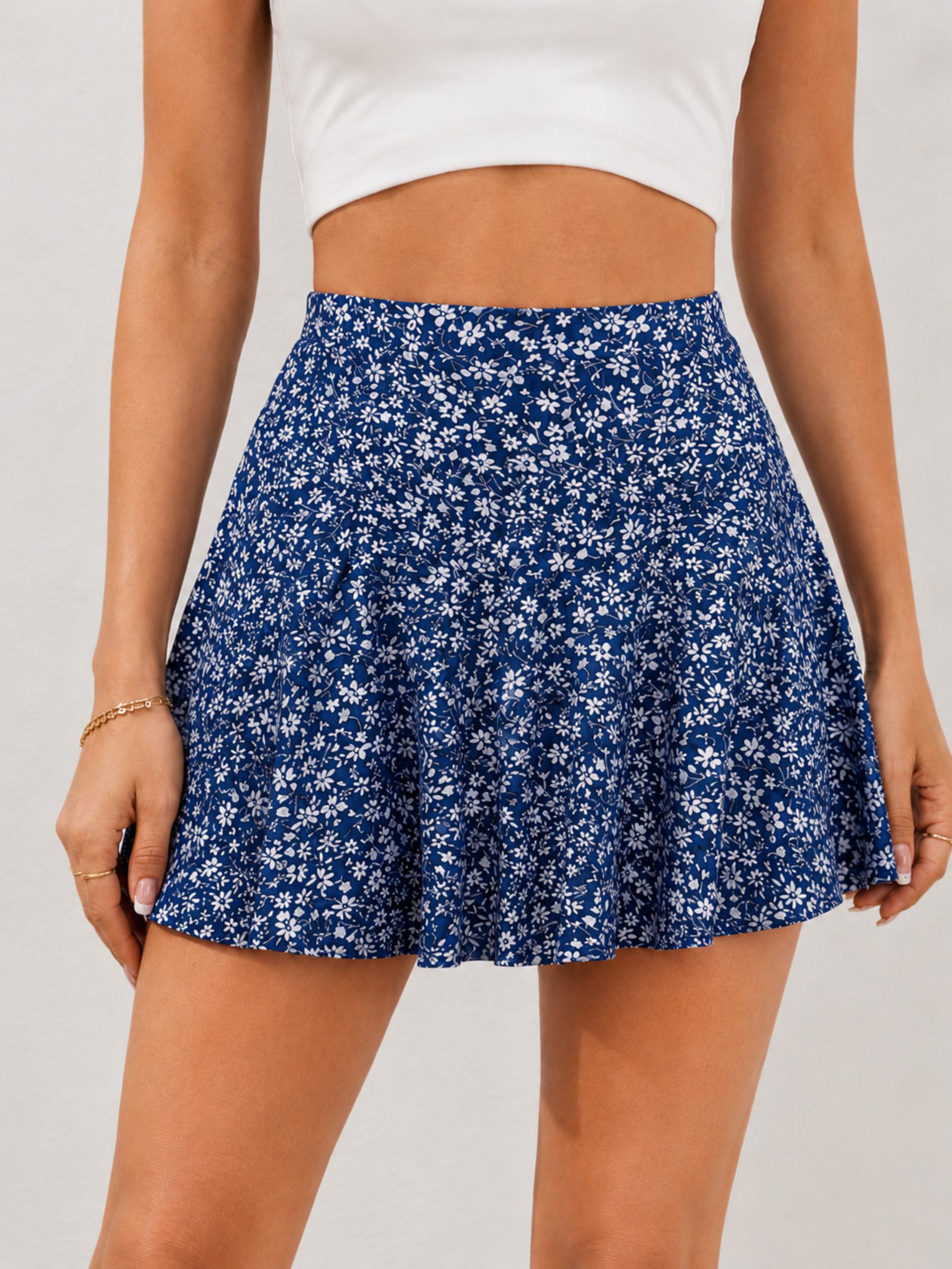 Elegant Love Sommerrock High-Waist Minirock geblümt – Ausgestellter A-Linien-Rock Damen Skaterrock mit Streublumen – Schwingender Freizeitrock