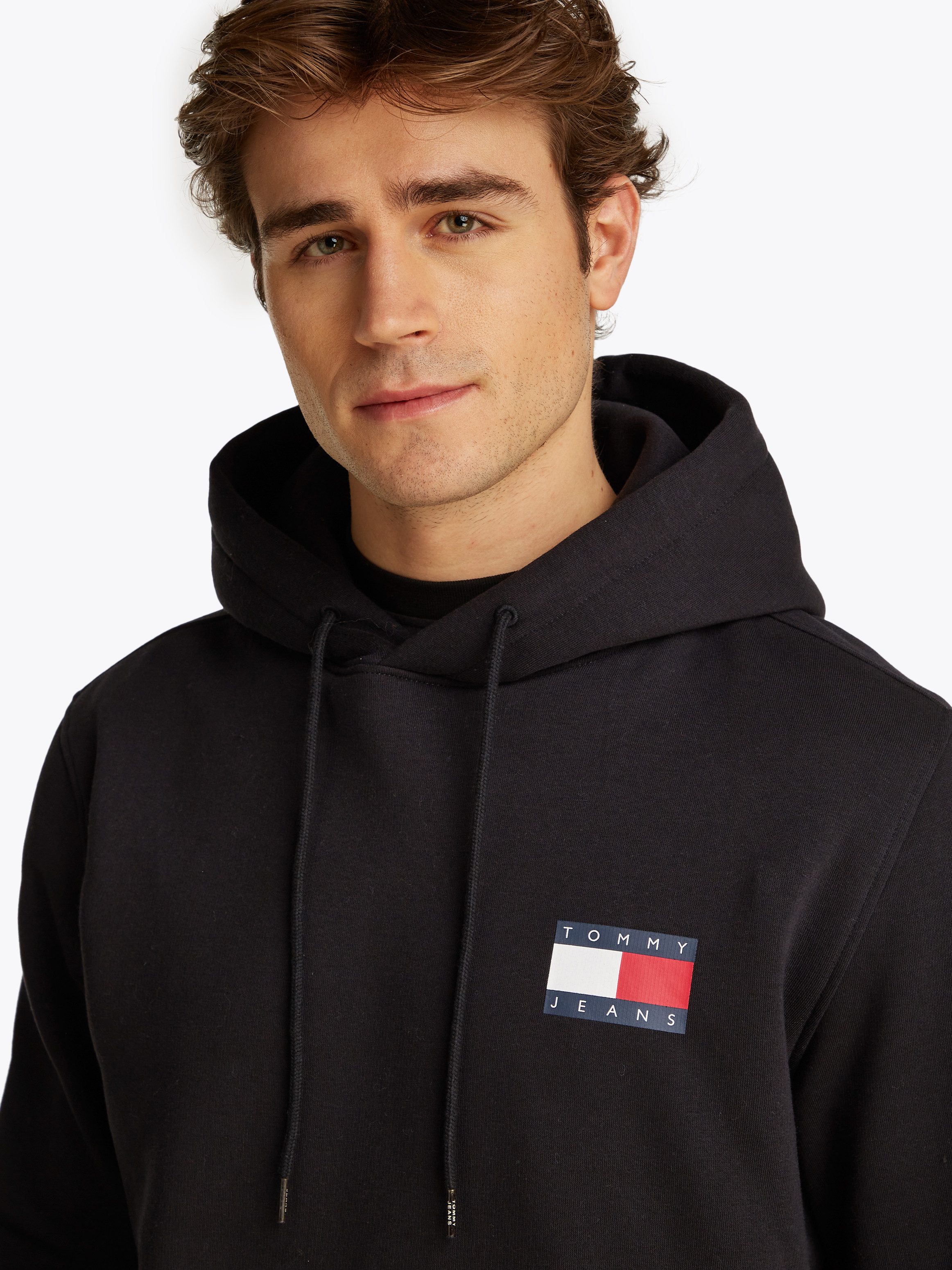 Tommy Jeans Sweatshirt TJM REG ESSENTIAL FLAG HOOD EXT mit bedruckten Marke günstig online kaufen