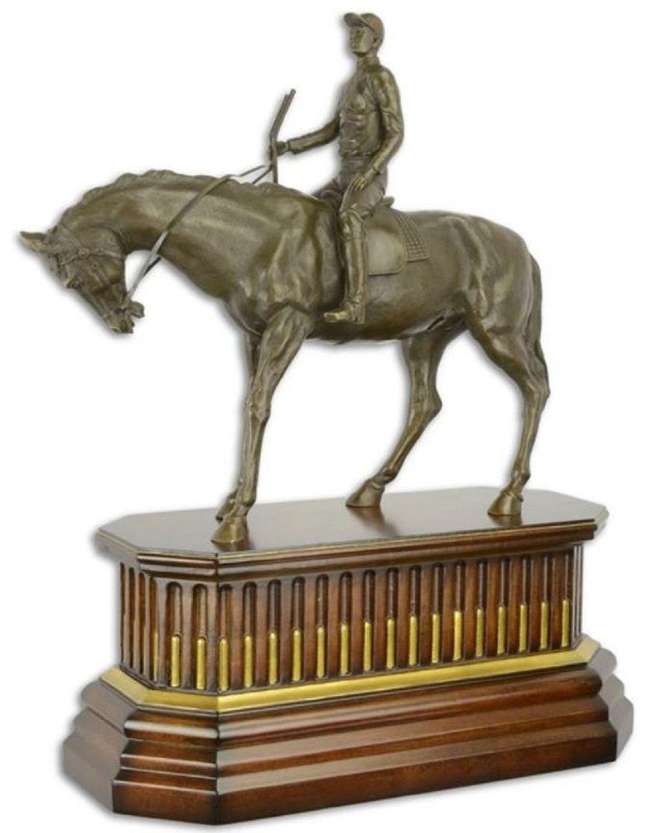 Casa Padrino Dekofigur Luxus Bronze Skulptur Jockey mit Pferd auf Holzsockel Bronze / Braun / Gold 44 x 19,8 x H. 52,4 cm - Bronzefigur - Dekofigur - Deko Accessoires