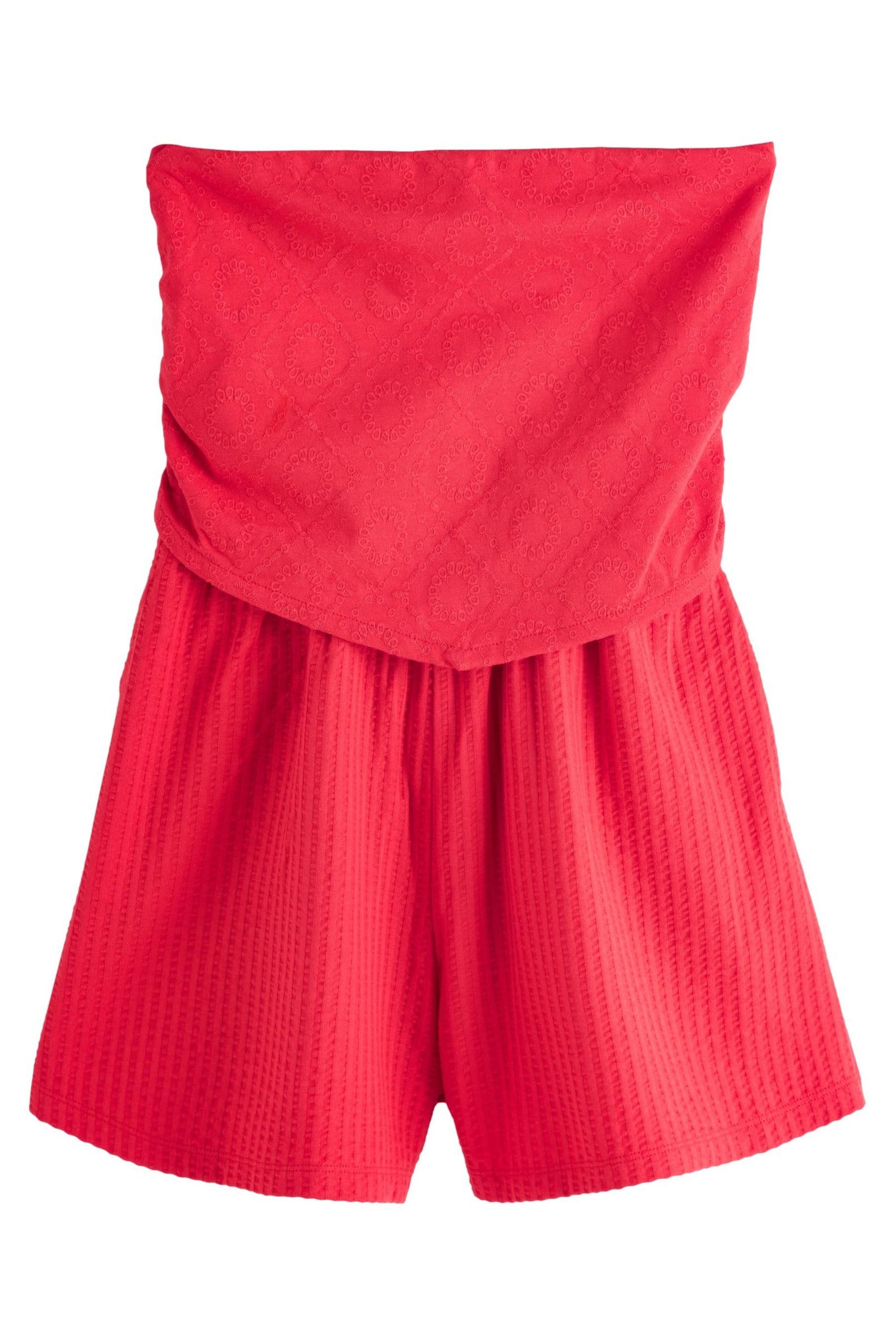 Next Playsuit Bandeau-Playsuit mit Zipfelsaum und Lochstickerei (1-tlg)