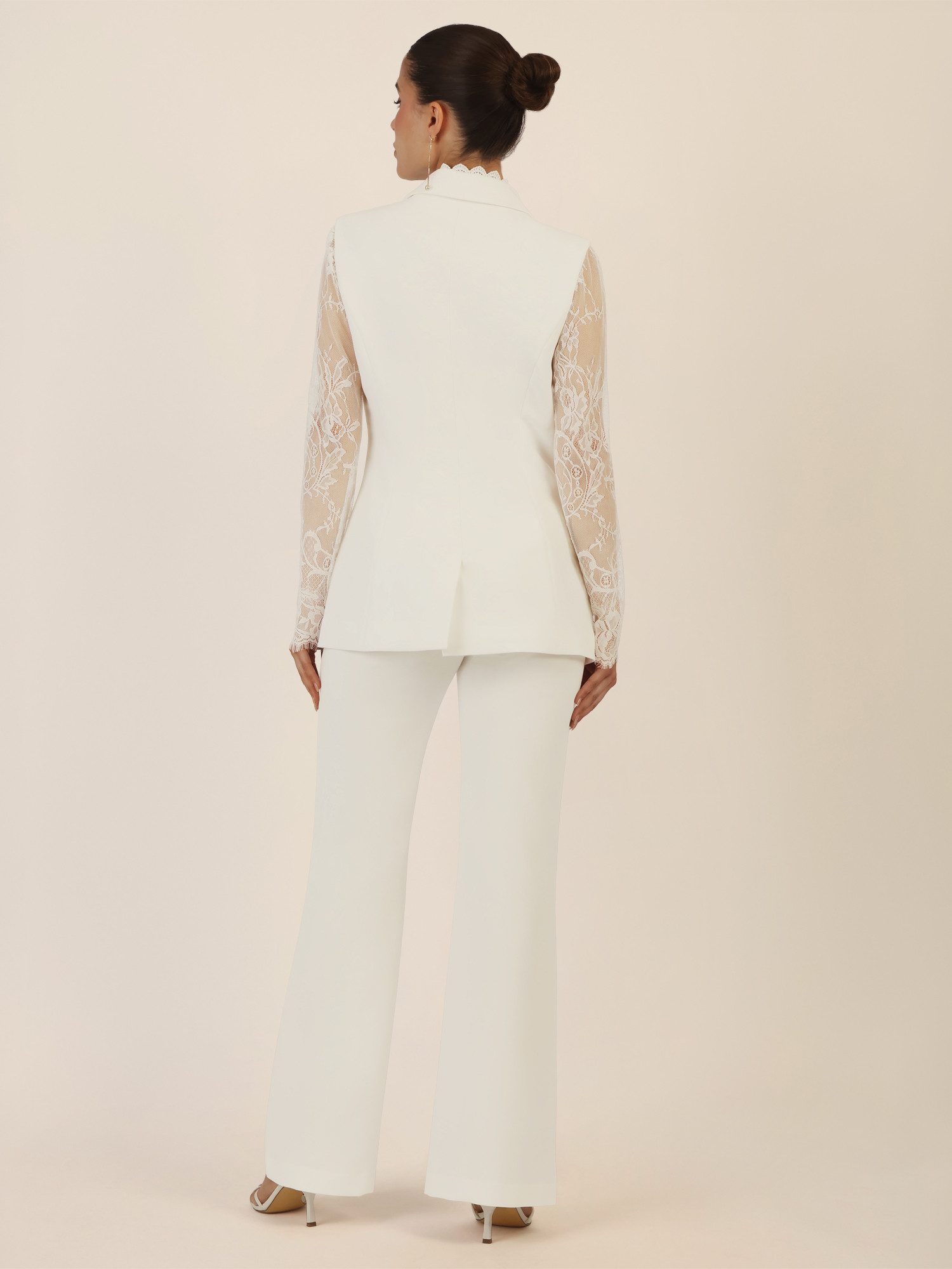 Apart pantsuit with lace details and decorative edge