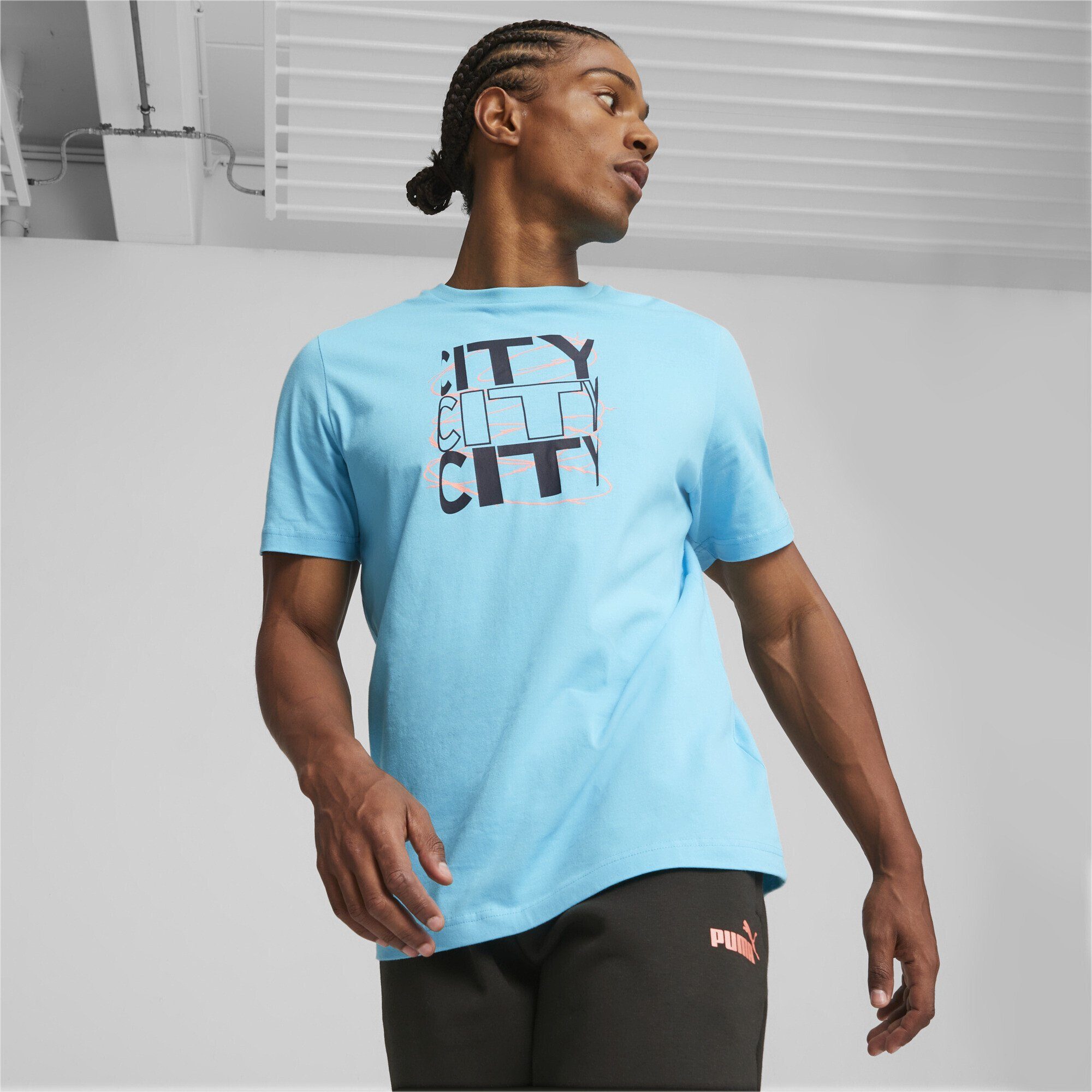 PUMA T-Shirt Manchester City FtblCore Dark Graphic T-Shirt Navy Hero Herren Black Blue