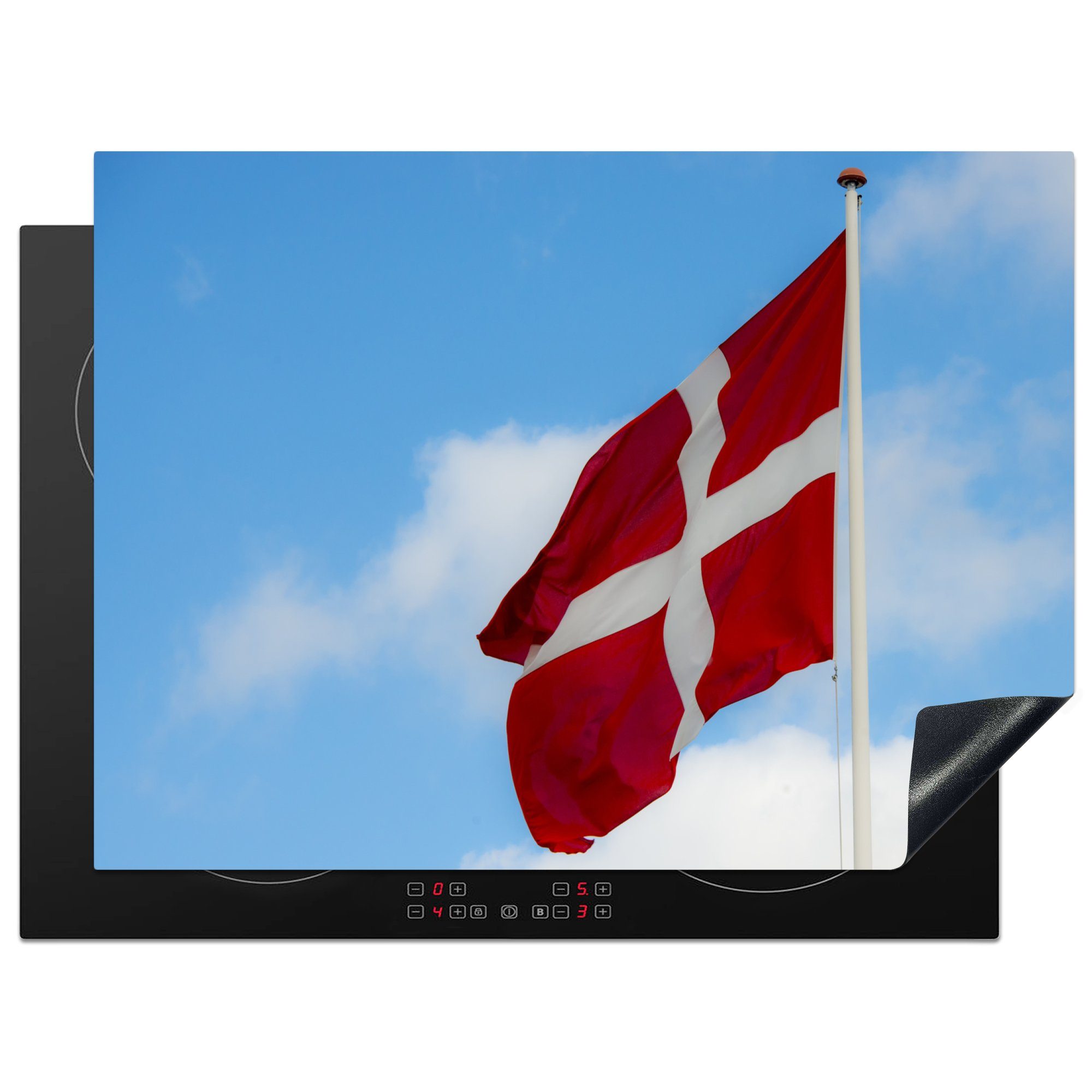 MuchoWow Herdblende-/Abdeckplatte Bild der dänischen Flagge vor einem blauen Himmel, Vinyl, (1 tlg), 71x52 cm, Induktionskochfeld Schutz für die küche, Ceranfeldabdeckung