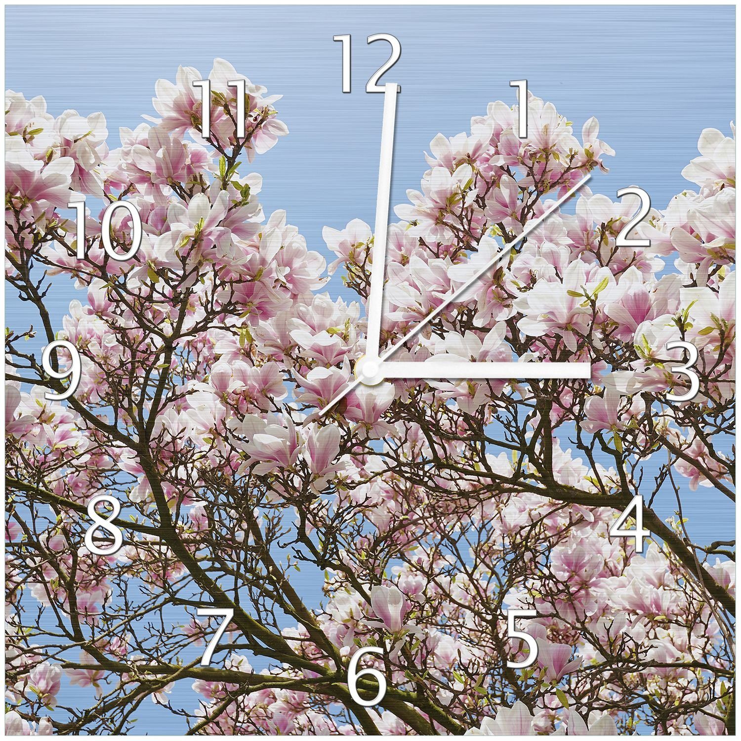 Wallario Wanduhr Schöne rosa Magnolien-Blüten vor blauem Himmel (Aluverbunduhr)