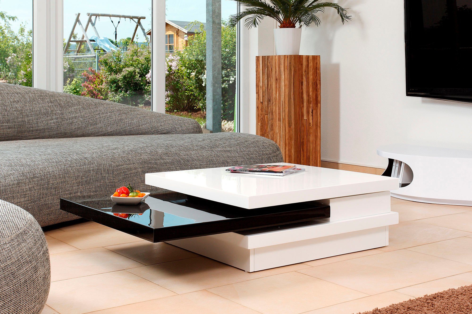 SalesFever Couchtisch, Tischplatte drehbar um schwarz/weiß 360°