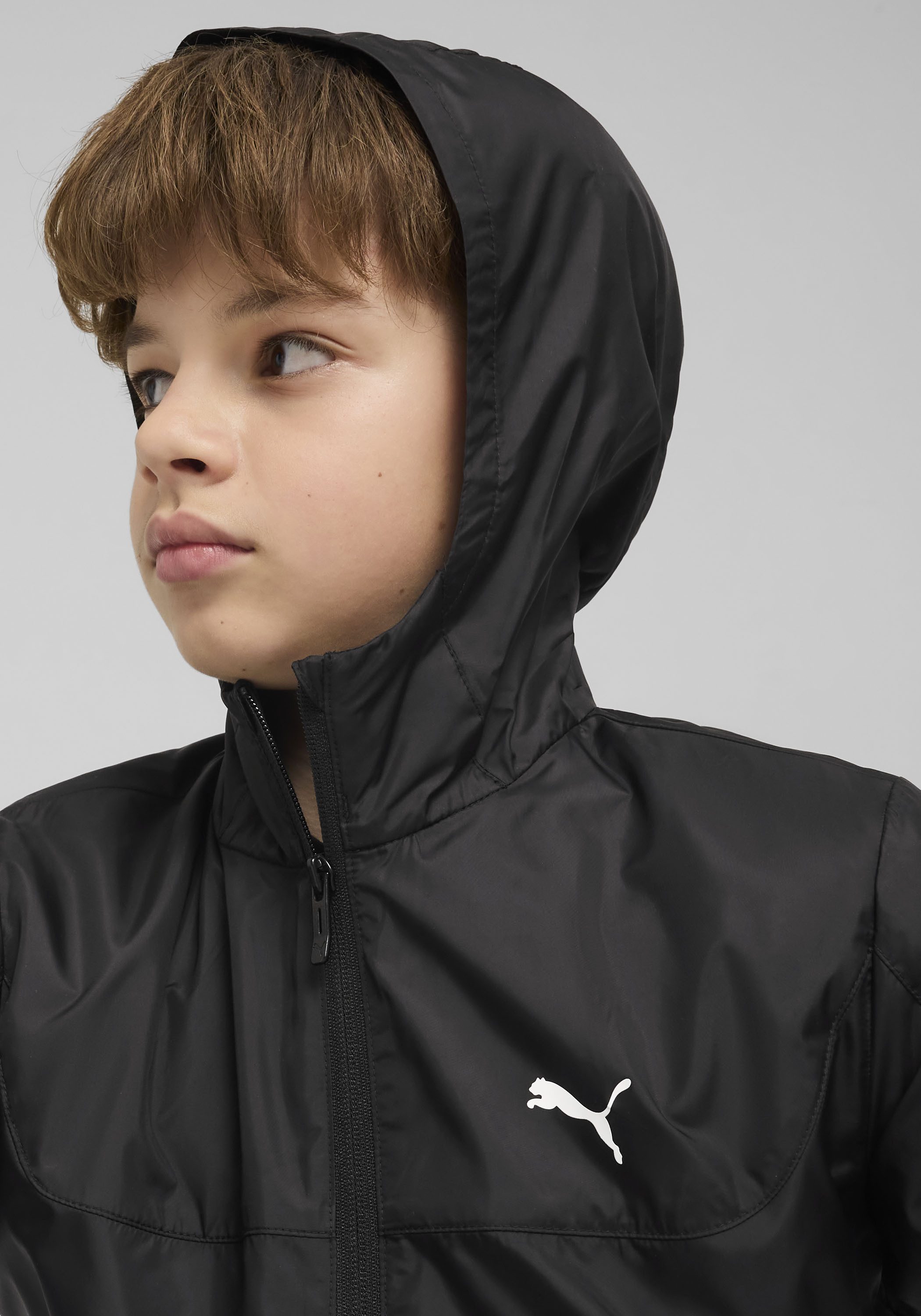 PUMA Windbreaker ESS UV WINDBREAKER für Jugendliche, mit Kapuze, mit Eingrifftasche
