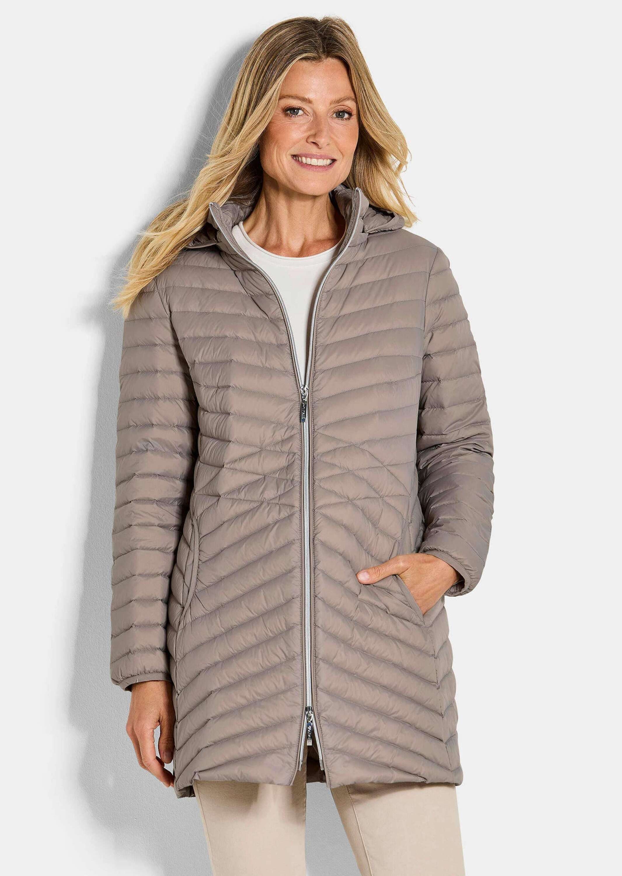 GOLDNER Winterjacke Gefütterter langer Mantel mit Kapuze Wintermantel in femininer Steppung mit Stehkragen und Taschen