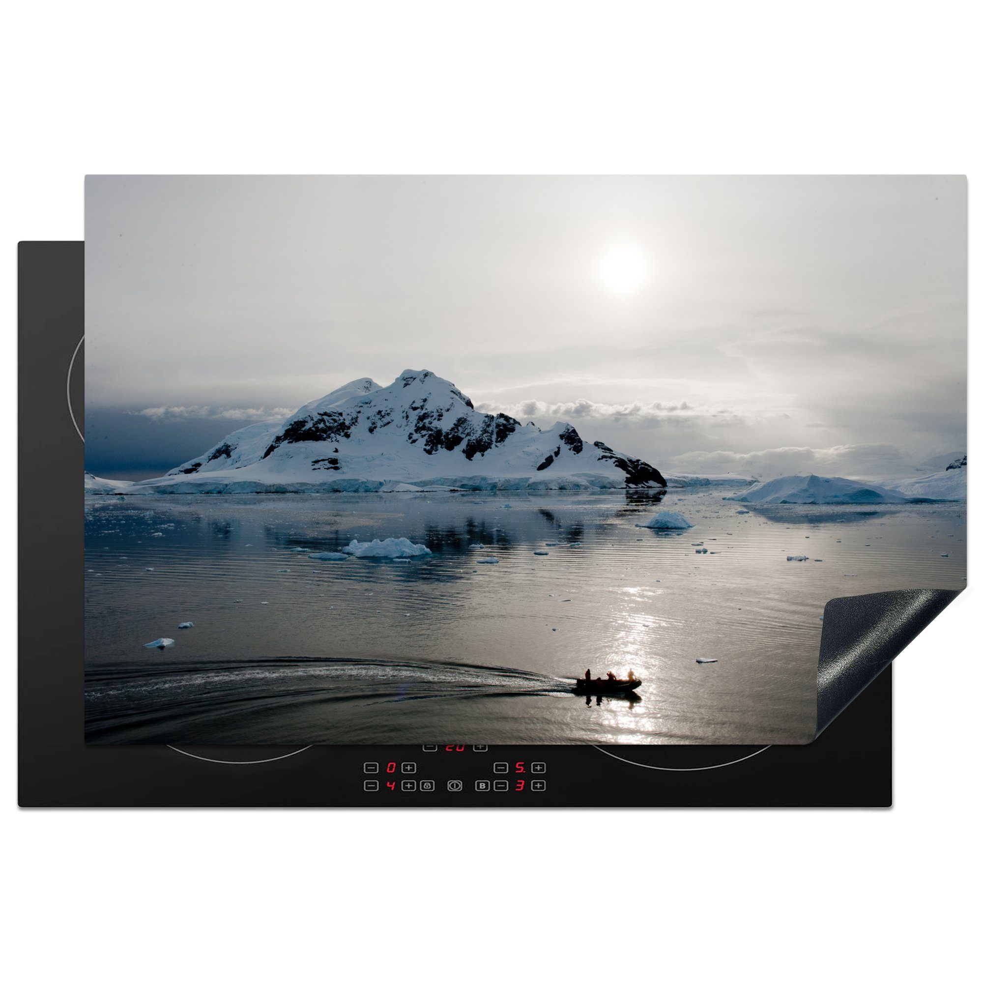 MuchoWow Herdblende-/Abdeckplatte Ein aufblasbares Boot in der Antarktis, Vinyl, (1 tlg), 81x52 cm, Induktionskochfeld Schutz für die küche, Ceranfeldabdeckung
