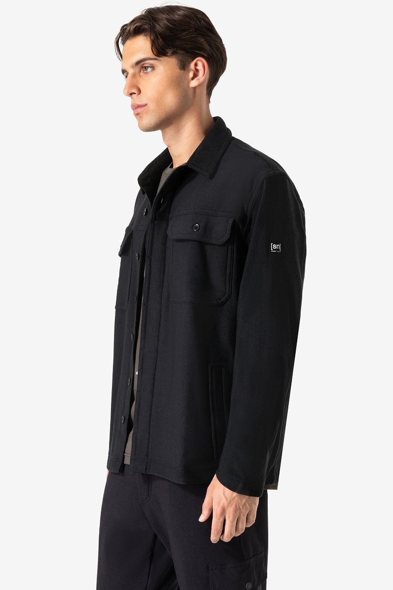 SUPER.NATURAL Langarmshirt Merino Jacke M ALPINE ACTIVE OVERSHIRT funktioneller Merino-Materialmix Jet Black