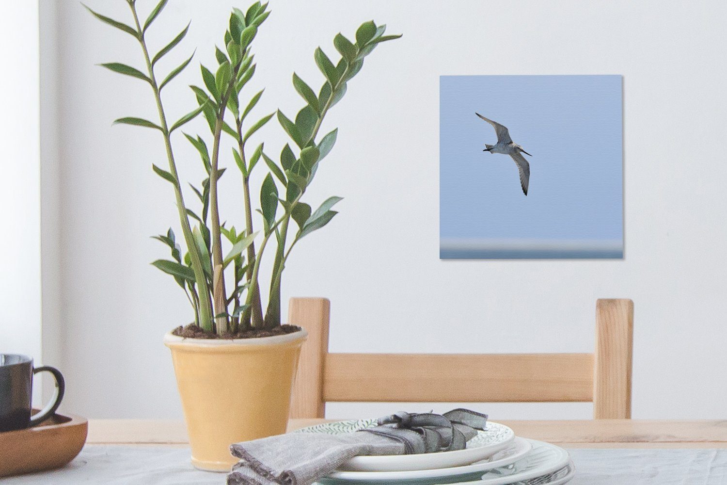 Leinwand Rotschnabelschnepfe Bilder über Strand, Schlafzimmer OneMillionCanvasses® für fliegt Leinwandbild St), Wohnzimmer den (1