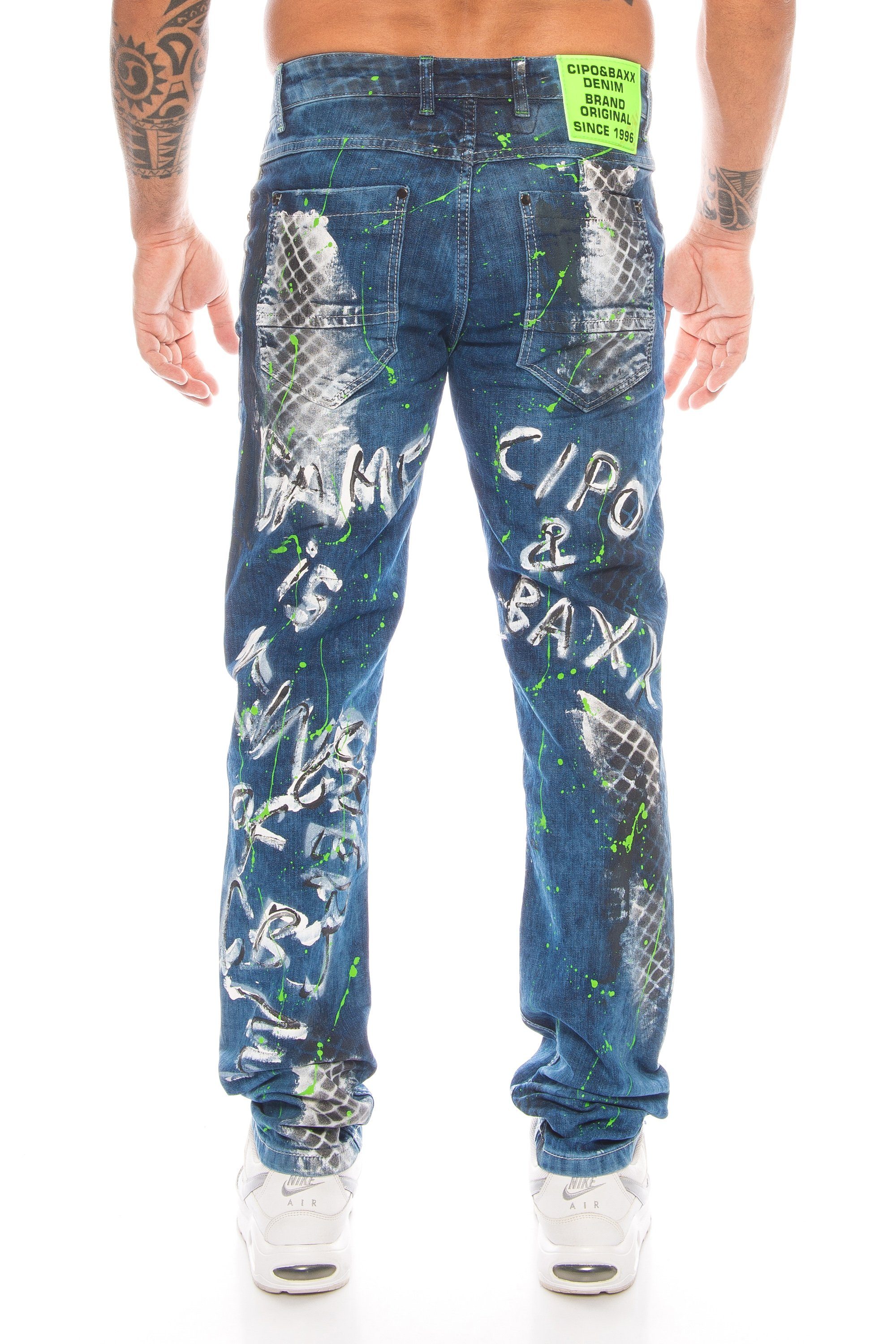 Cipo & Baxx Slim-fit-Jeans »Herren Jeans Hose mit ausgefallenem Graffiti  Design« Aufwendige Verarbeitung mit Nieten und neongrünen Details